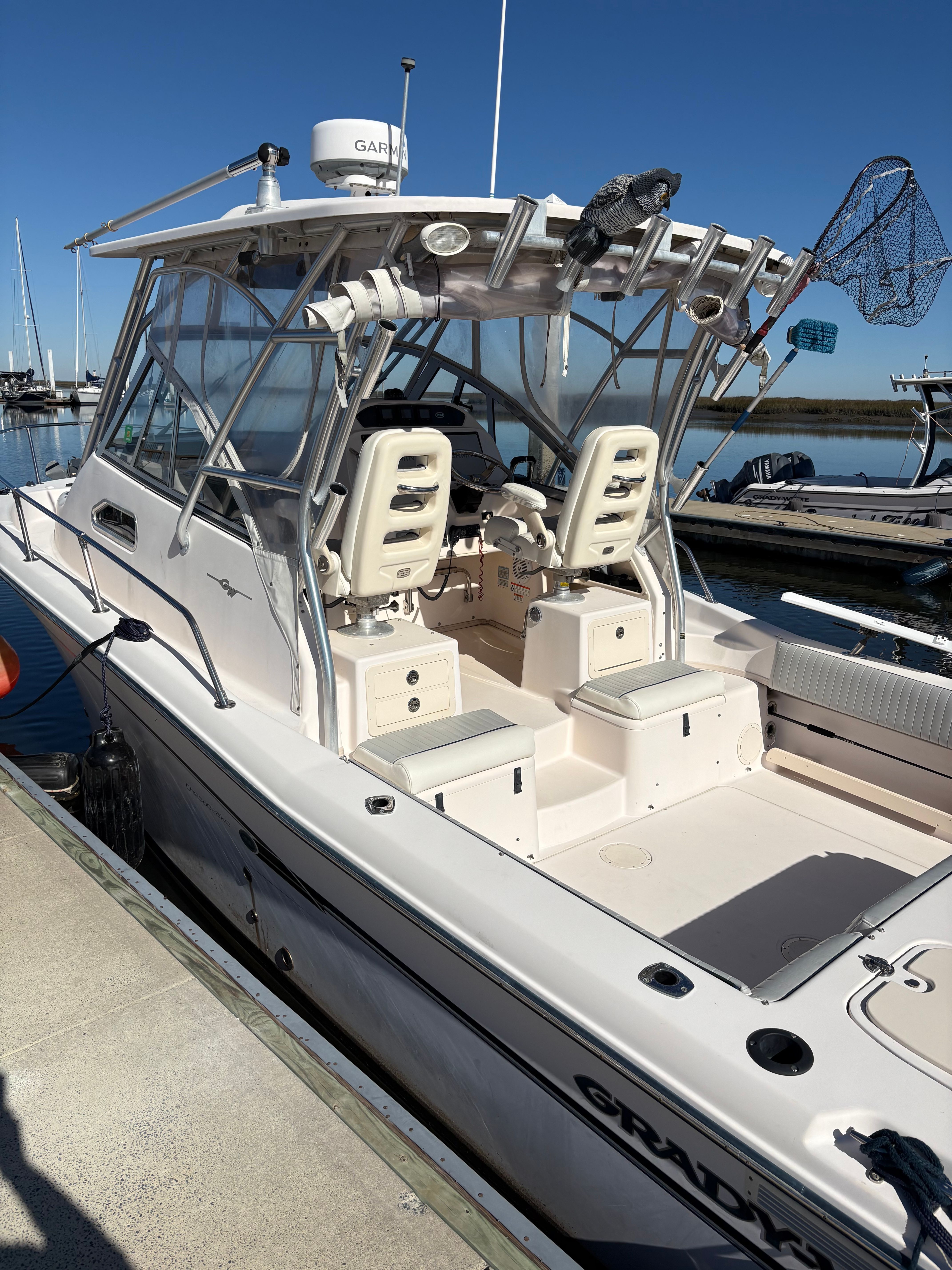 2009 Grady-White Chesapeake 290 boat docked at marina.