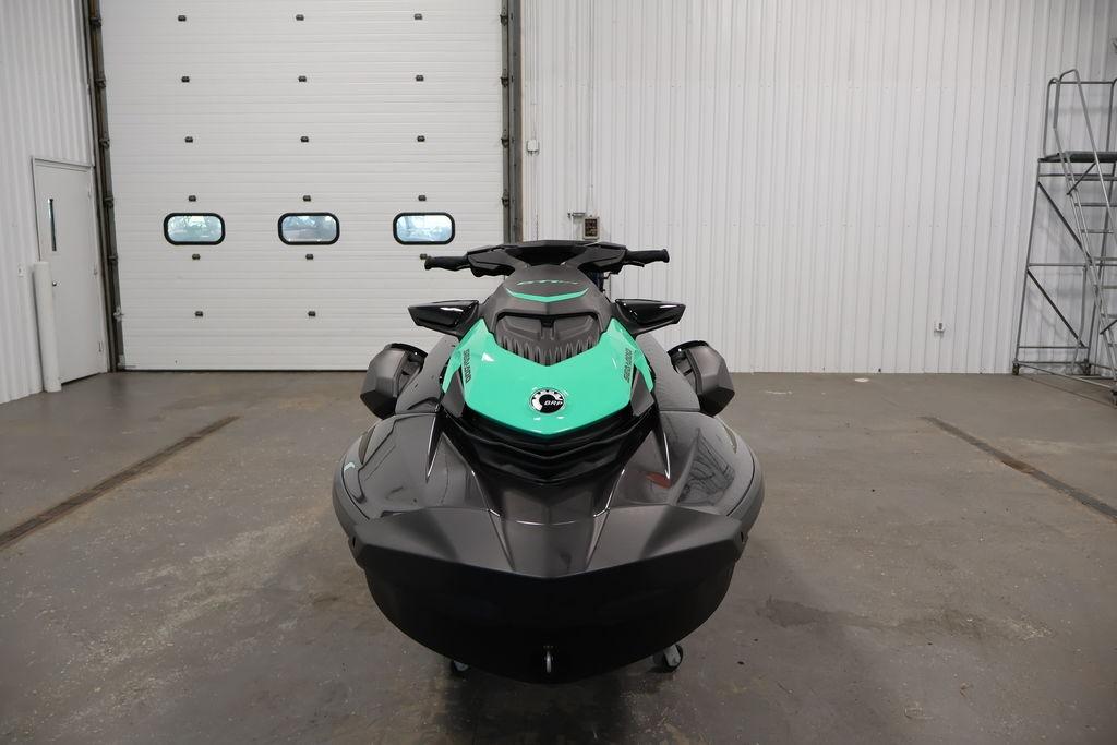 2026 Sea-Doo GTI SE 130 jet ski in a garage, front view.