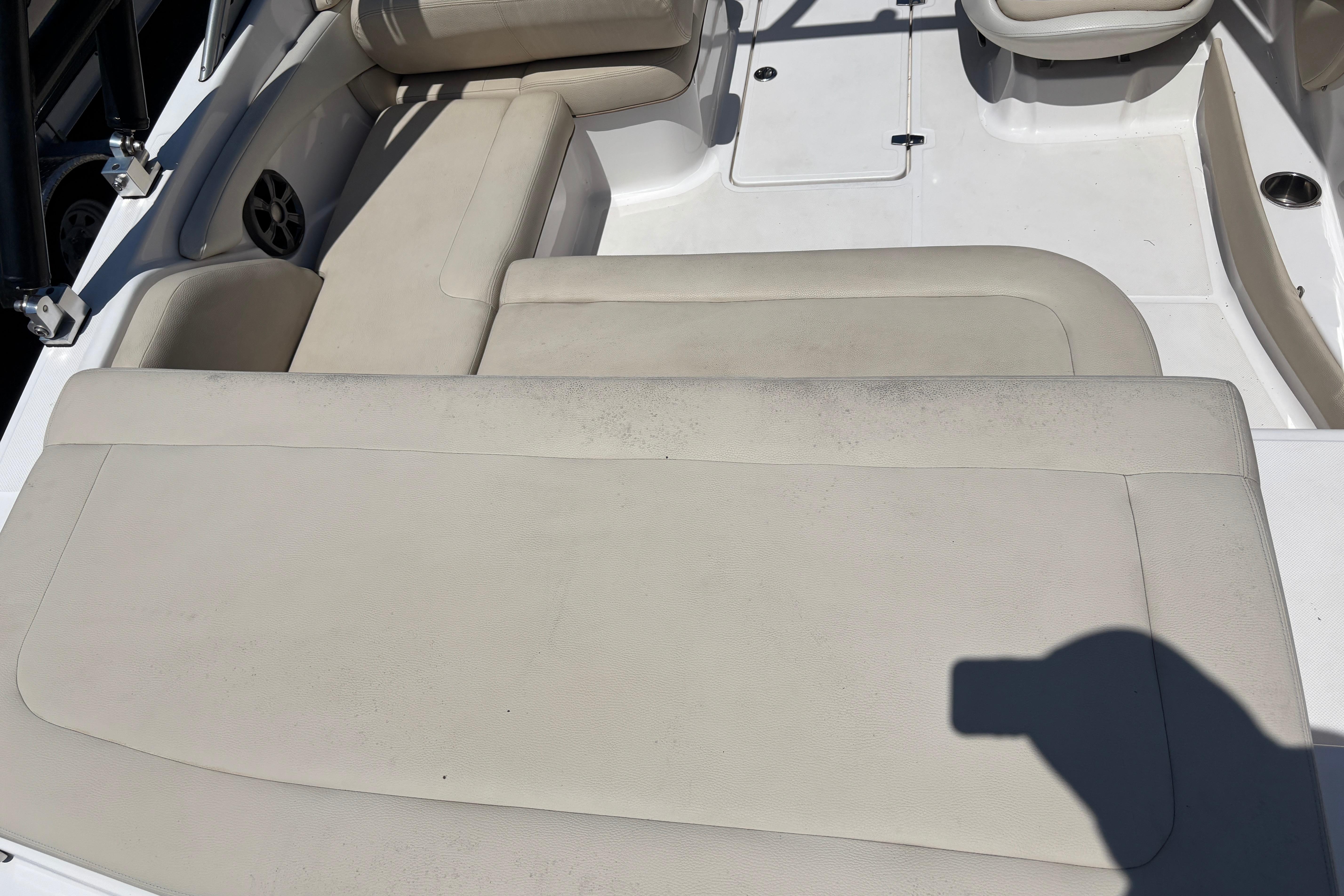 2018 Regal 1900 ES Bowrider interior with beige seating and speaker detail.