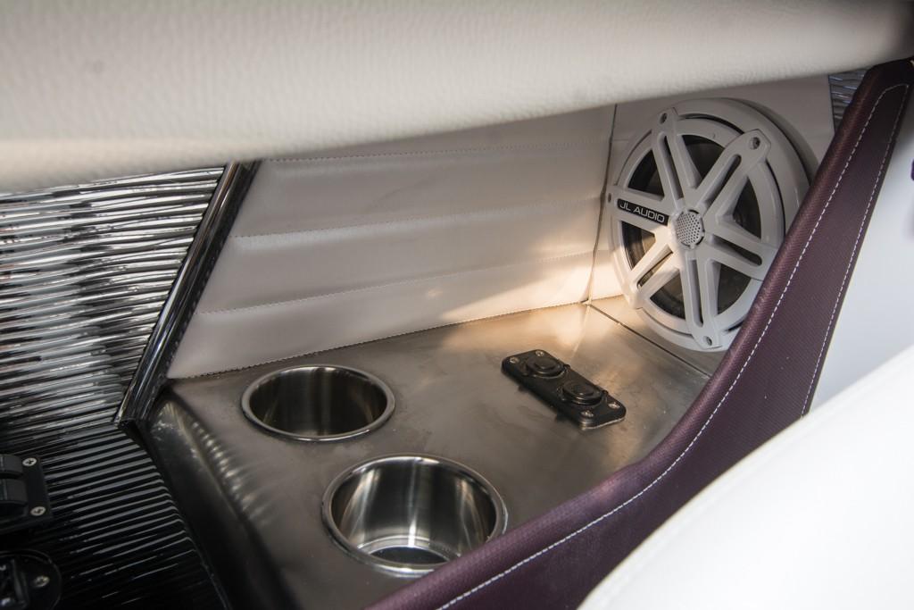 Interior of 2019 Donzi 41 GT boat with cup holders and speaker.