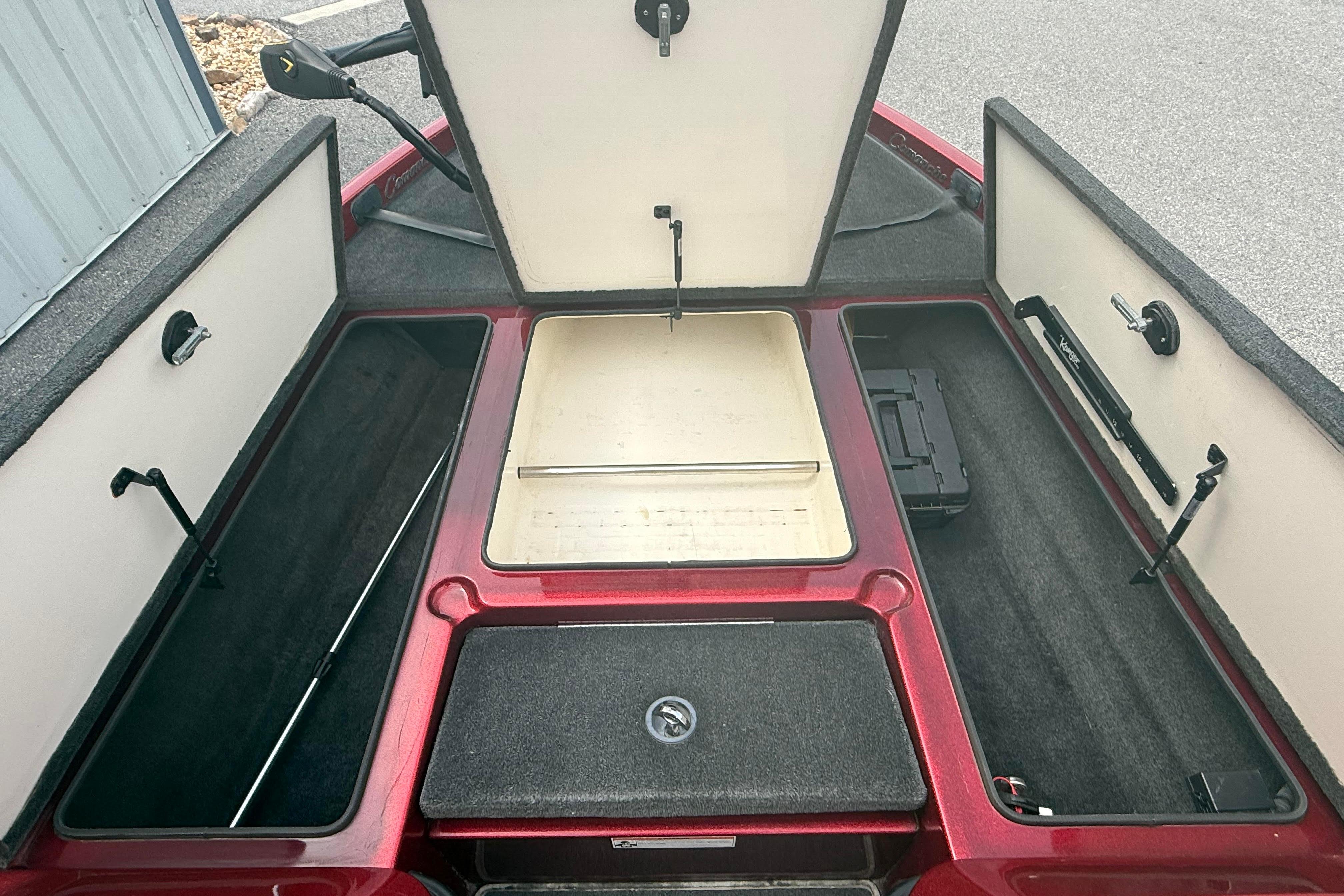 2007 Ranger 519 VX boat storage compartments open, showcasing spacious interior layout.