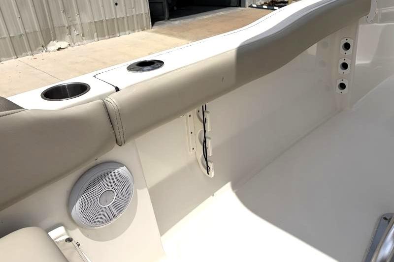2023 Key West 203 FS boat interior with cup holders and speaker.