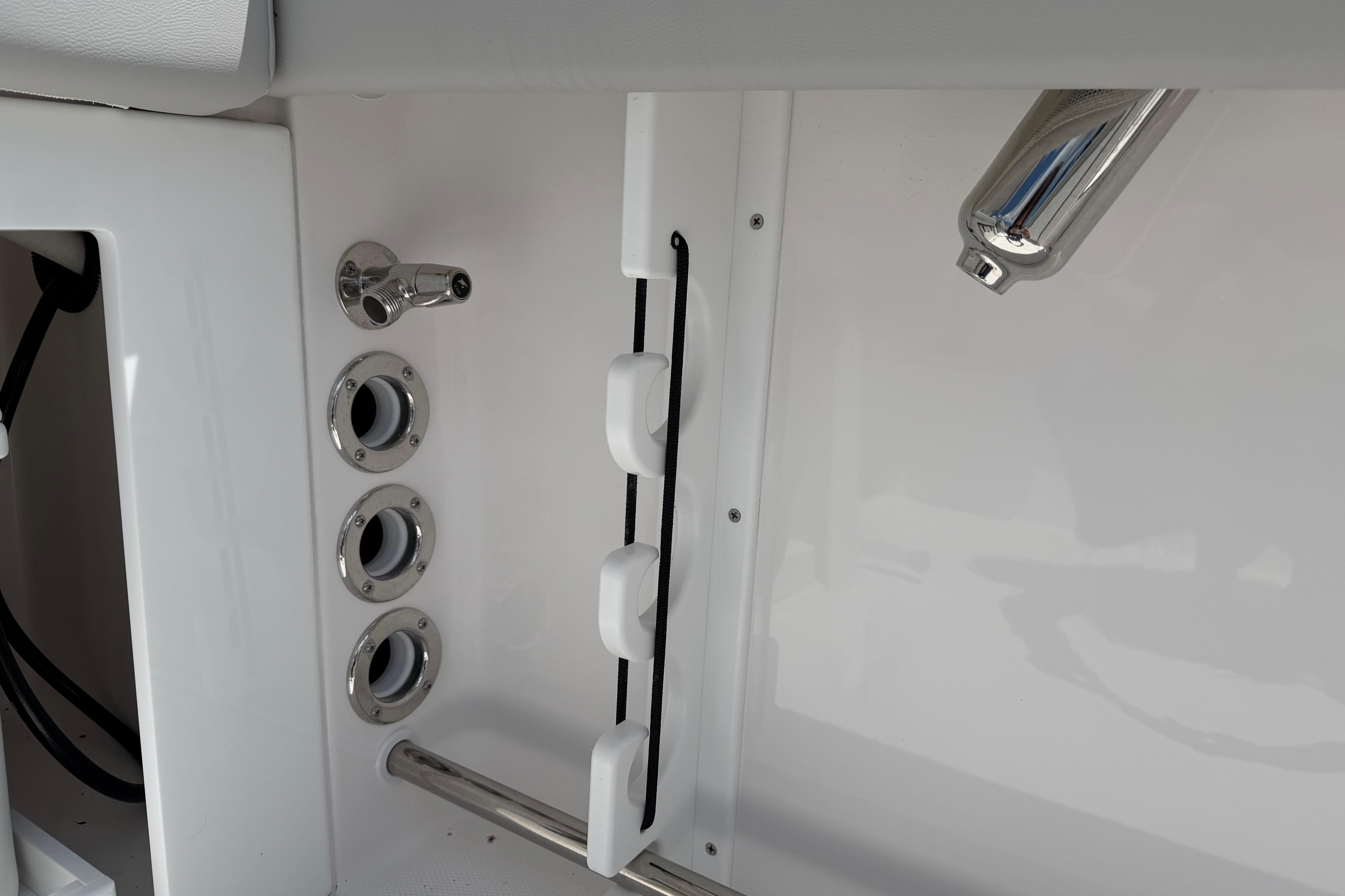 Interior features of the 2026 Edgewater 248CX Crossover boat, showcasing sleek design elements.