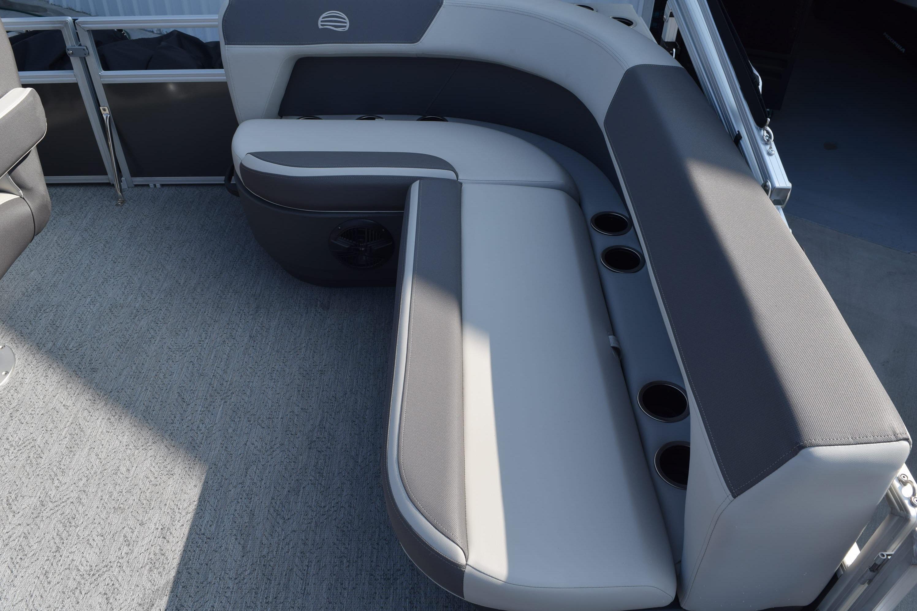 2026 Sun Tracker Bass Buggy 16 XL Select boat interior with cushioned seating and cup holders.