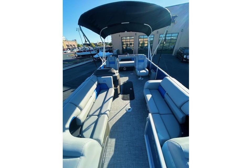 2026 Sun Tracker Party Barge 22 RF XP3 pontoon boat with spacious seating and canopy.