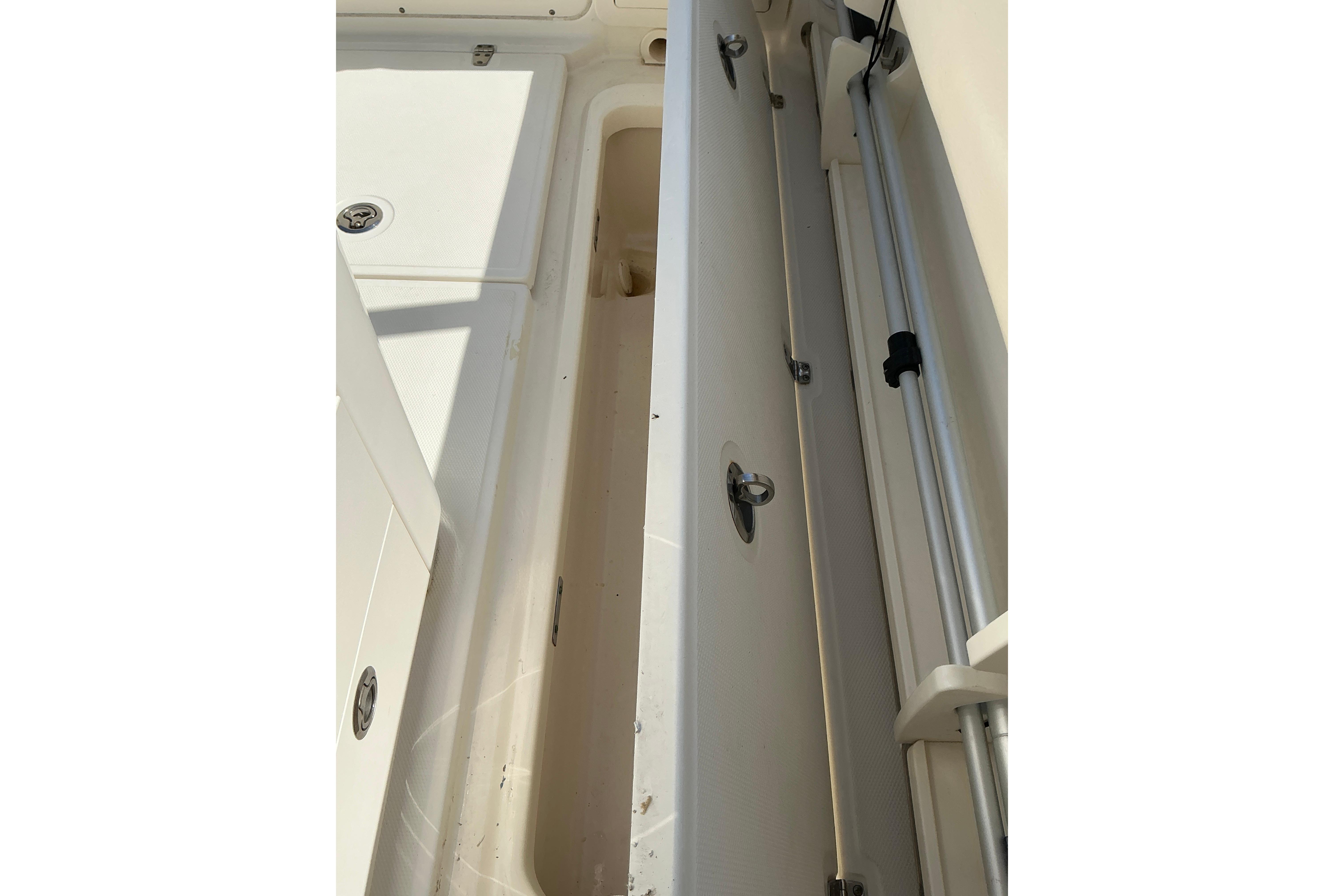 2017 Boston Whaler 250 Outrage interior storage compartment detail.