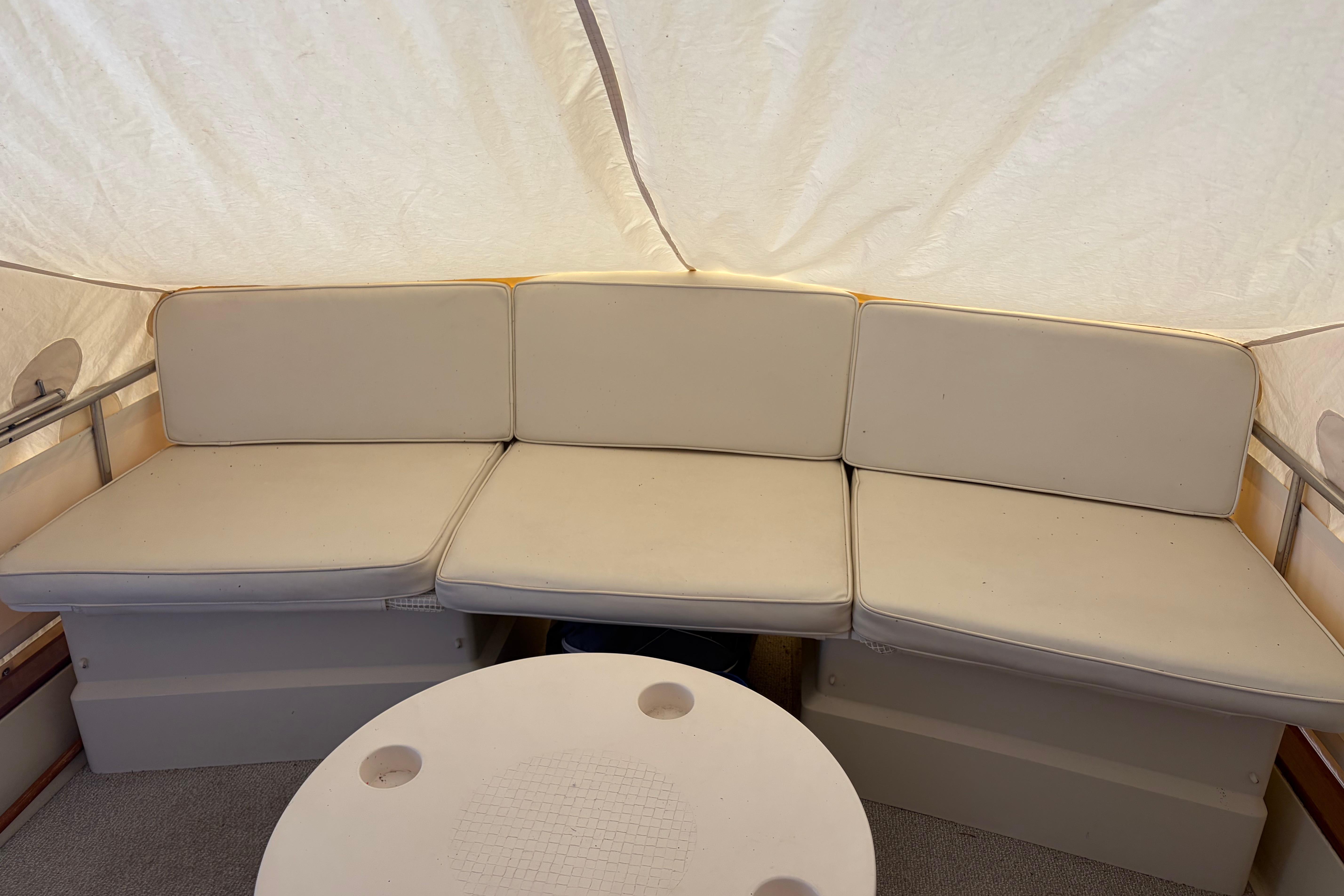 Cream-colored seating area on a 1971 Chris-Craft 42 Commander boat.