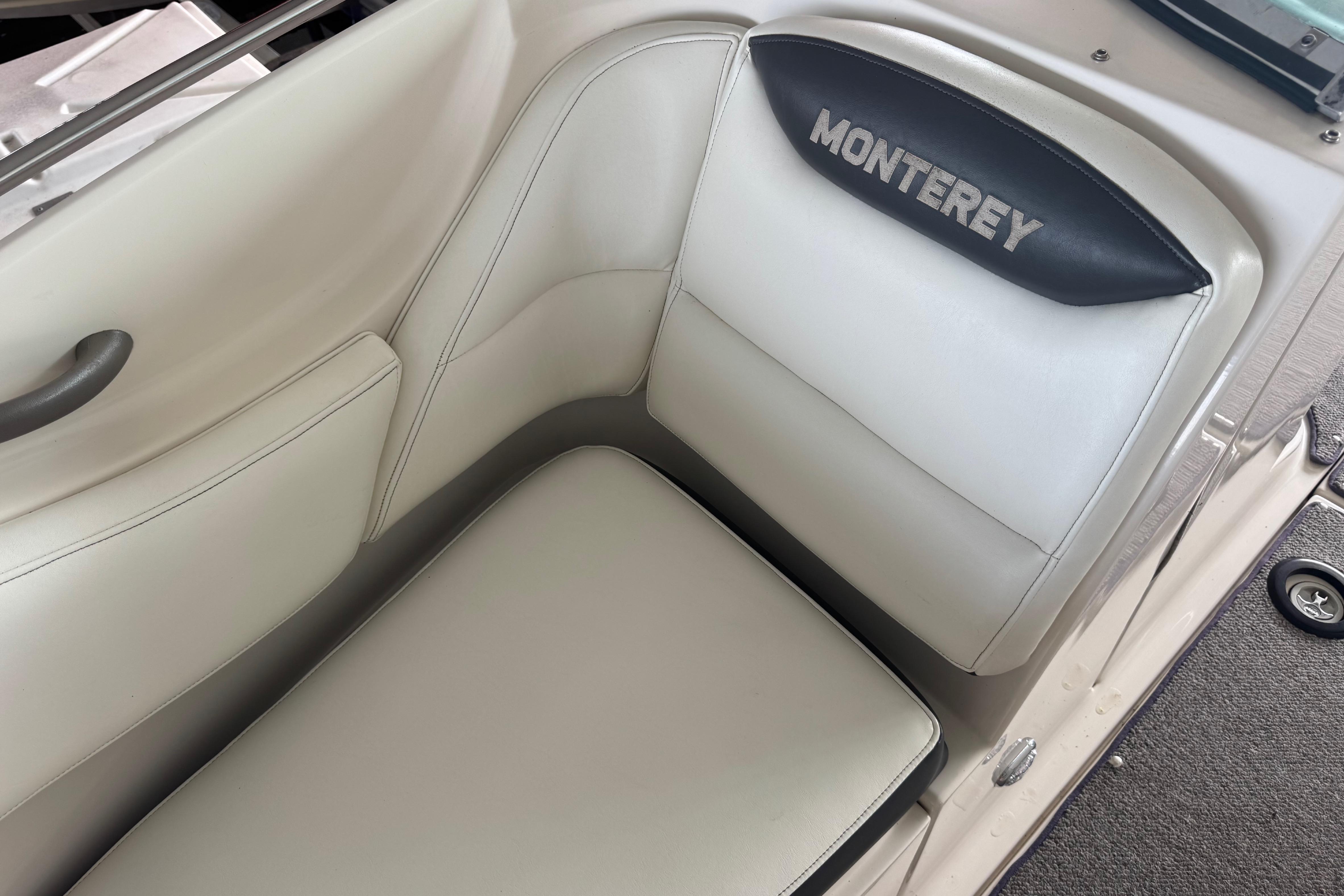 2005 Monterey 248LS Montura Bowrider interior seating with logo detail.
