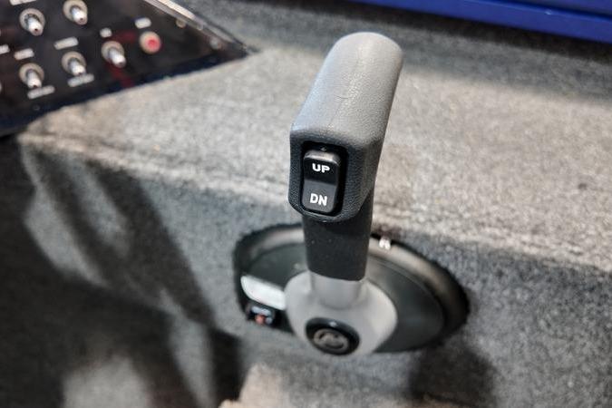 Throttle control lever in a 2024 Lowe Stinger 198 boat cockpit.