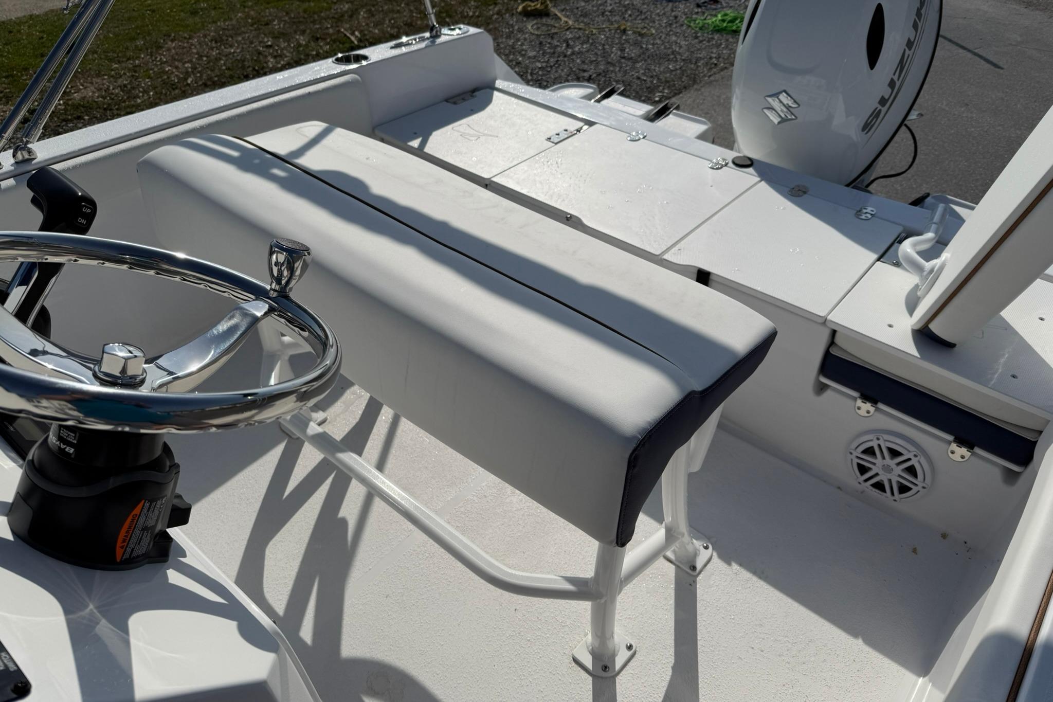 2026 Stingray 173 CC boat interior with steering wheel and seating.