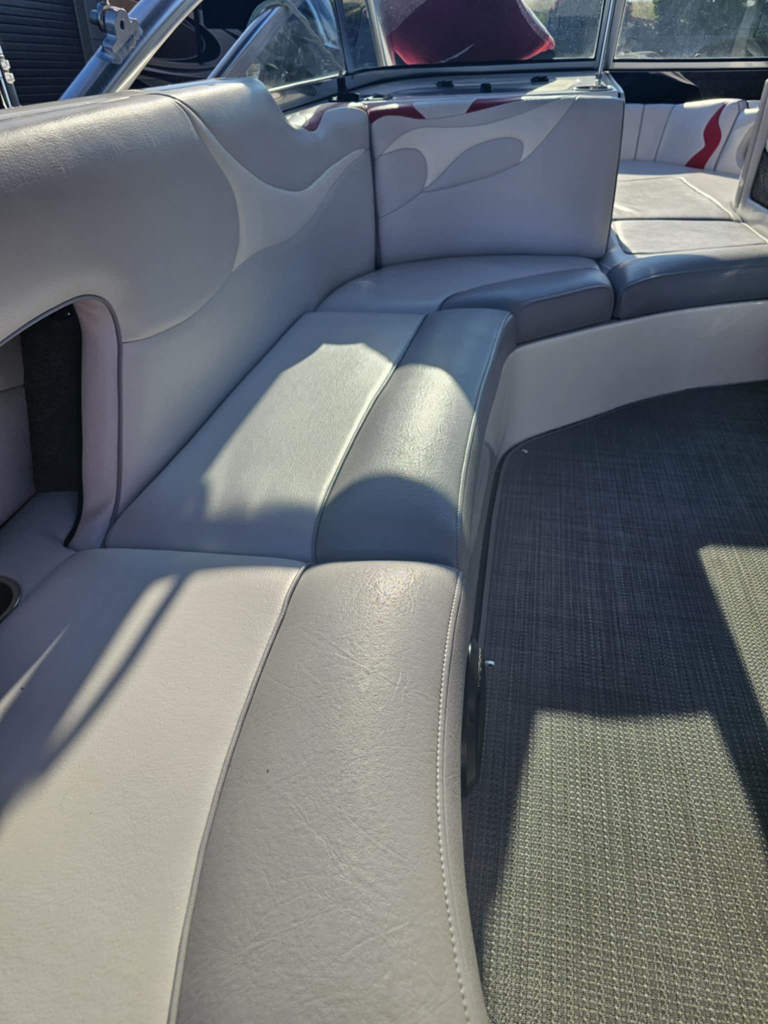 Interior of a 2006 MB PIGPR boat with gray leather seating.
