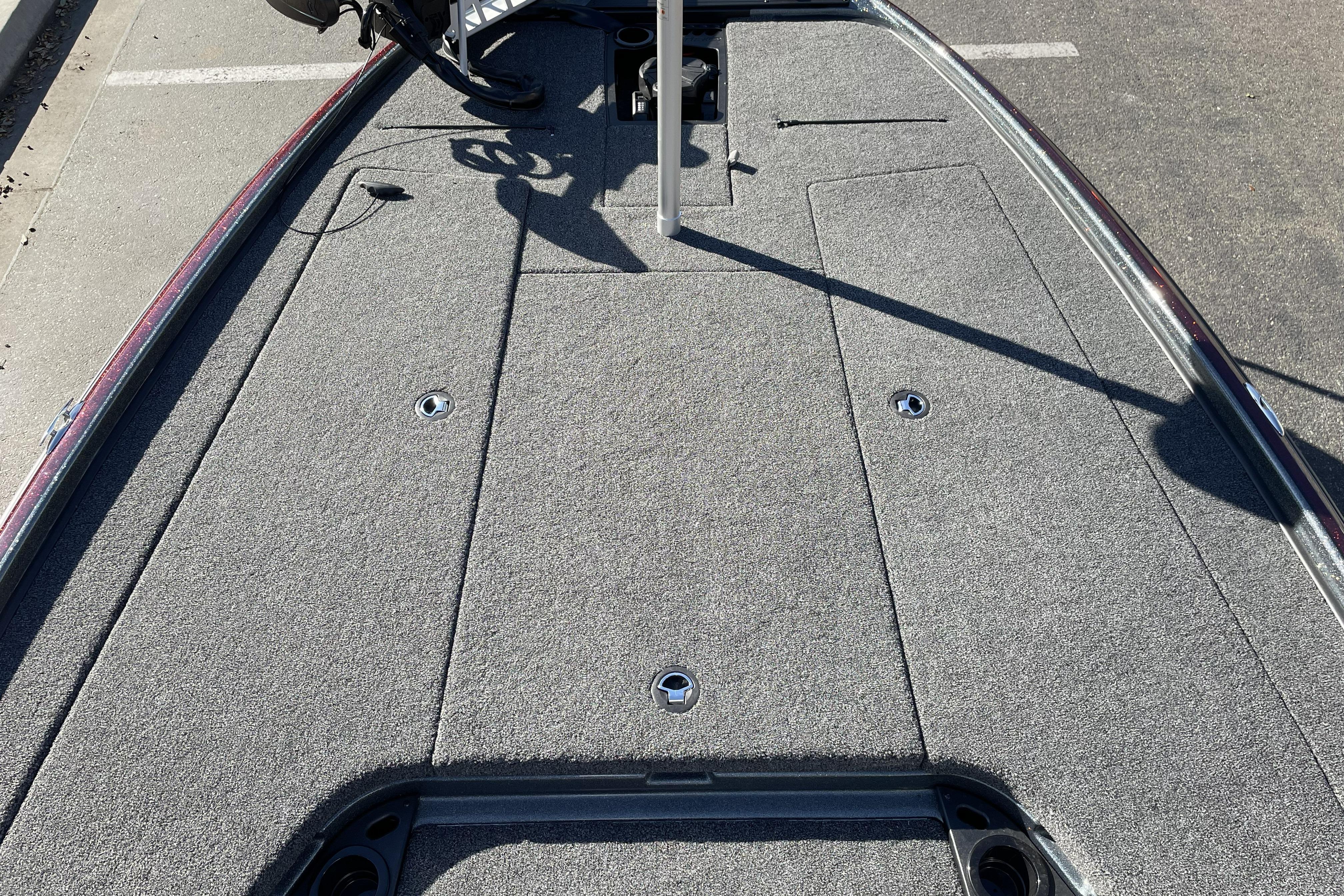 2026 Nitro Z20 XL boat deck with gray carpet and storage compartments.