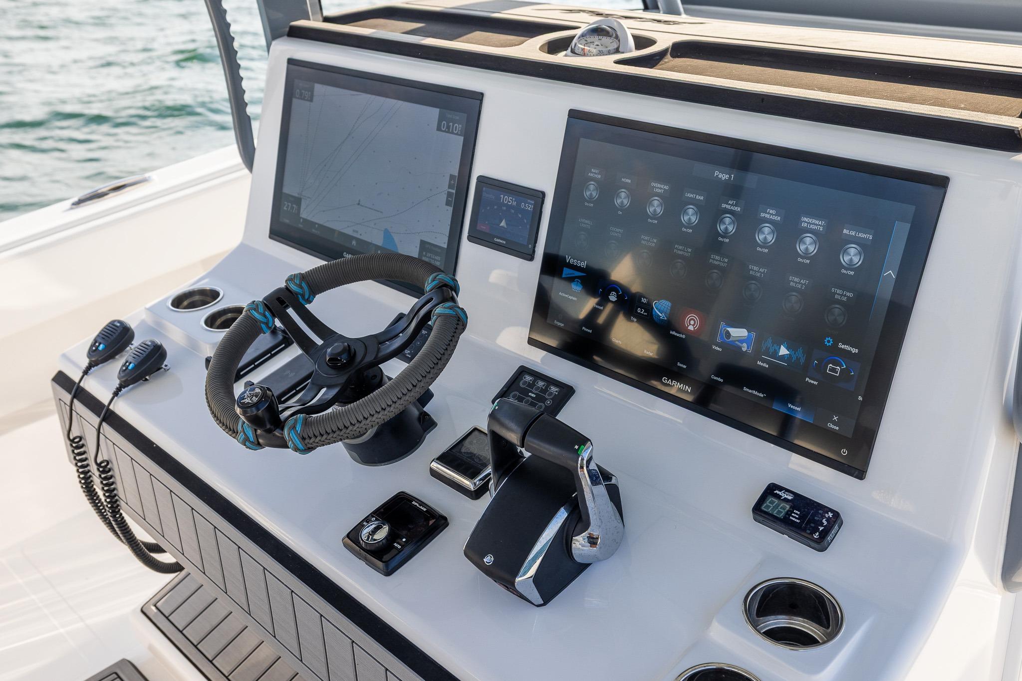 Control panel of 2026 Front Runner 37 Catamaran with advanced navigation displays.