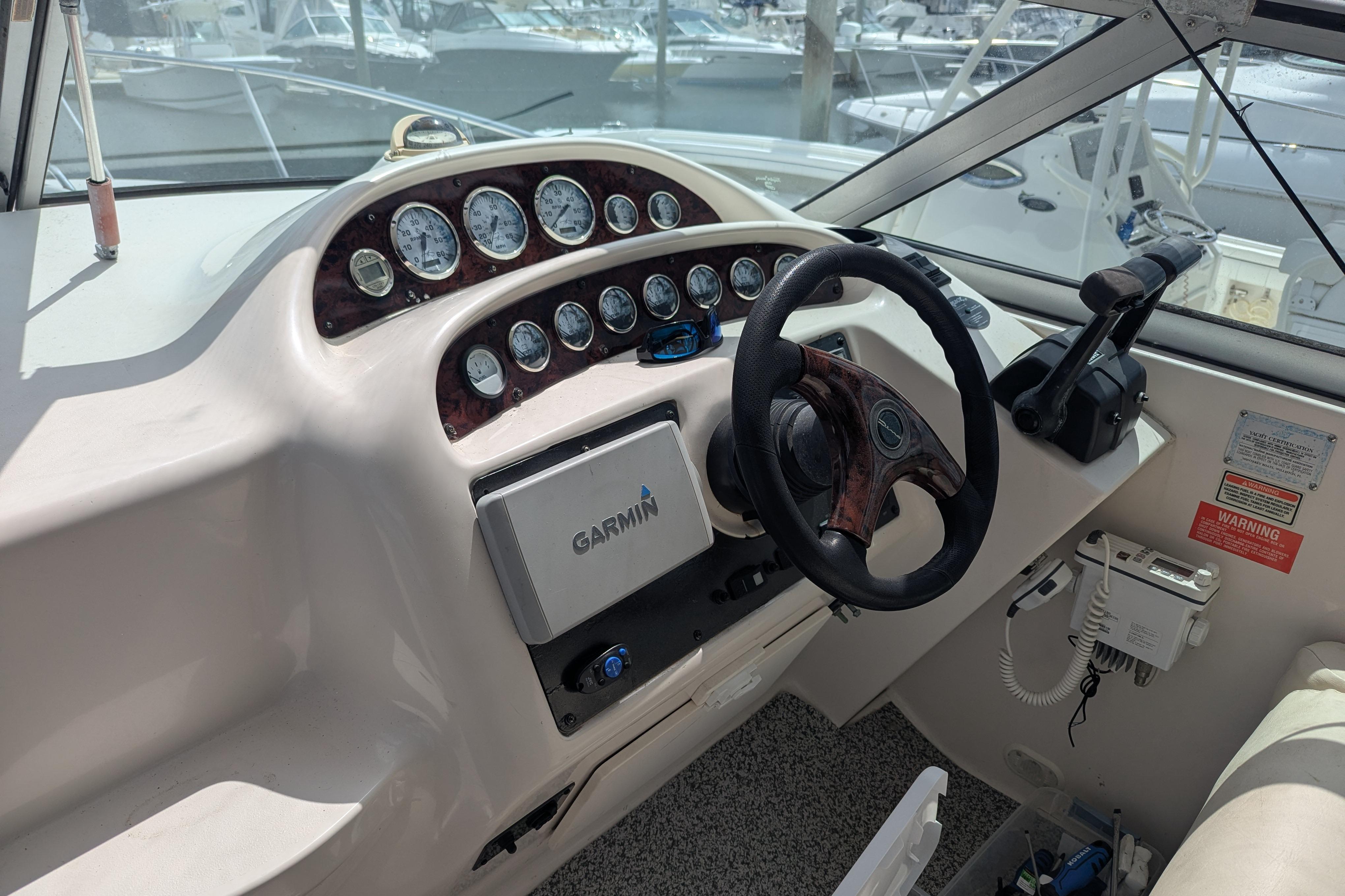 Cockpit of a 2003 Monterey 282 Cruiser with Garmin navigation system and control panel.