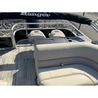 2025 Ranger Reata 223FC boat interior with beige seating and sleek design.