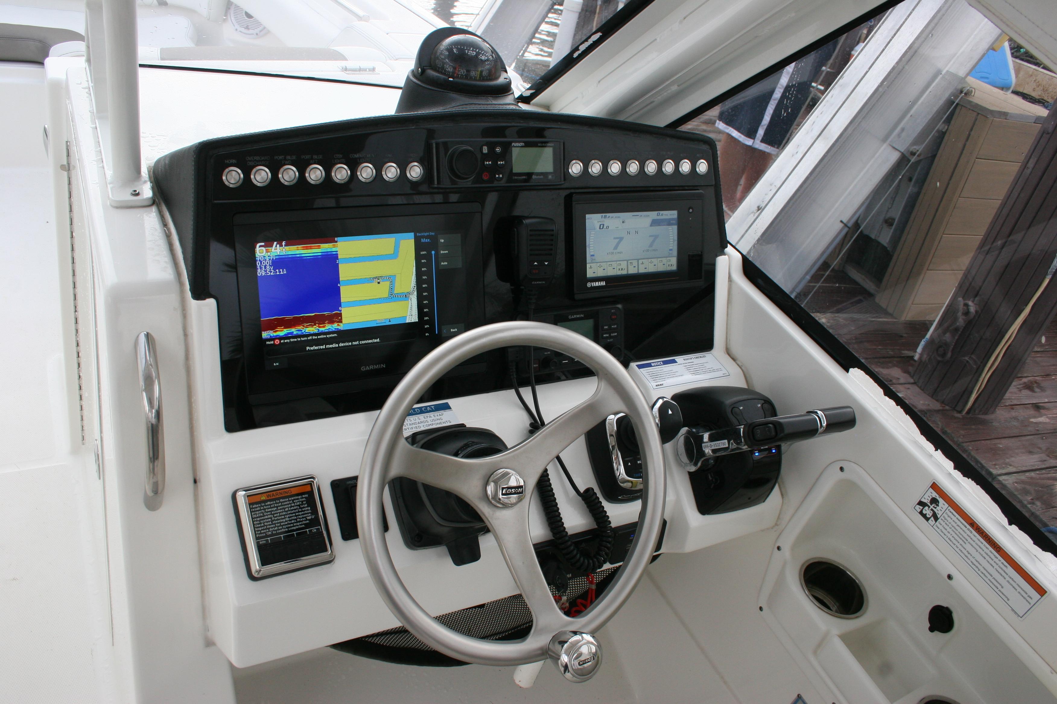 2021 World Cat 280 DC-X helm with advanced navigation and control systems.