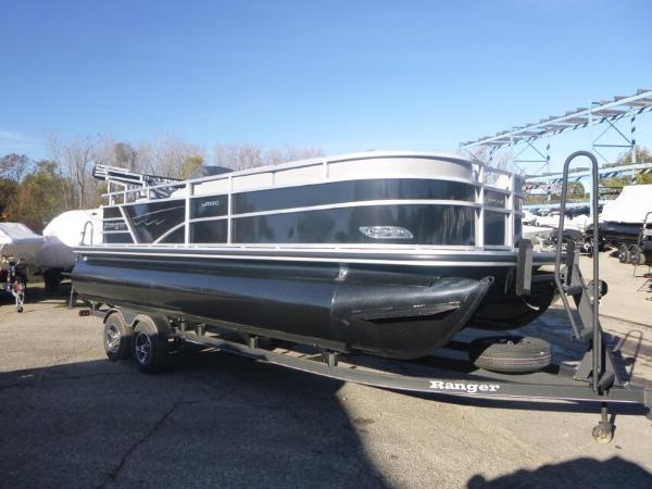 2024 Ranger Reata 223C pontoon boat on trailer in outdoor setting.