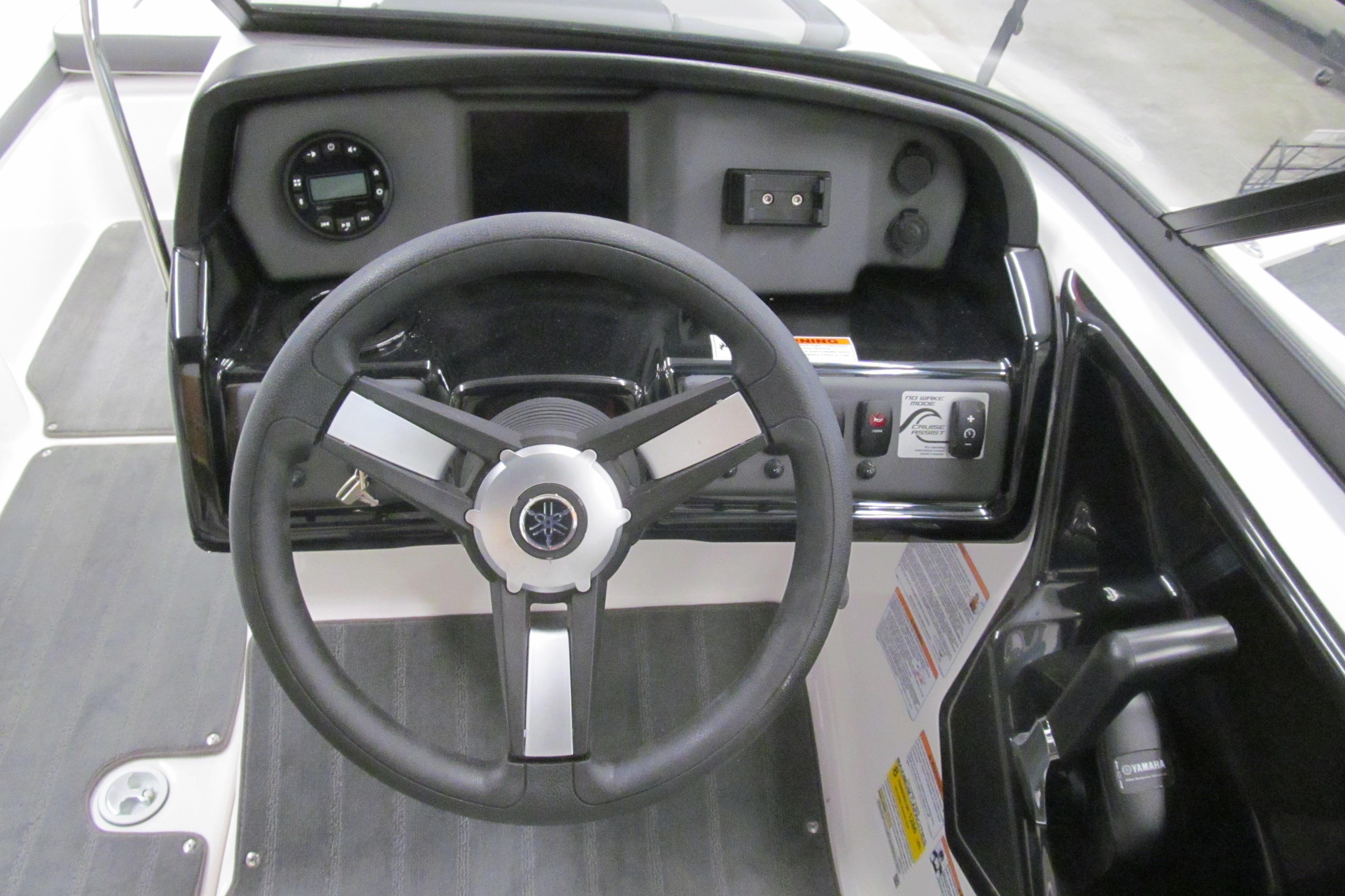 2026 Yamaha Boats SX190 dashboard with steering wheel and control panel.