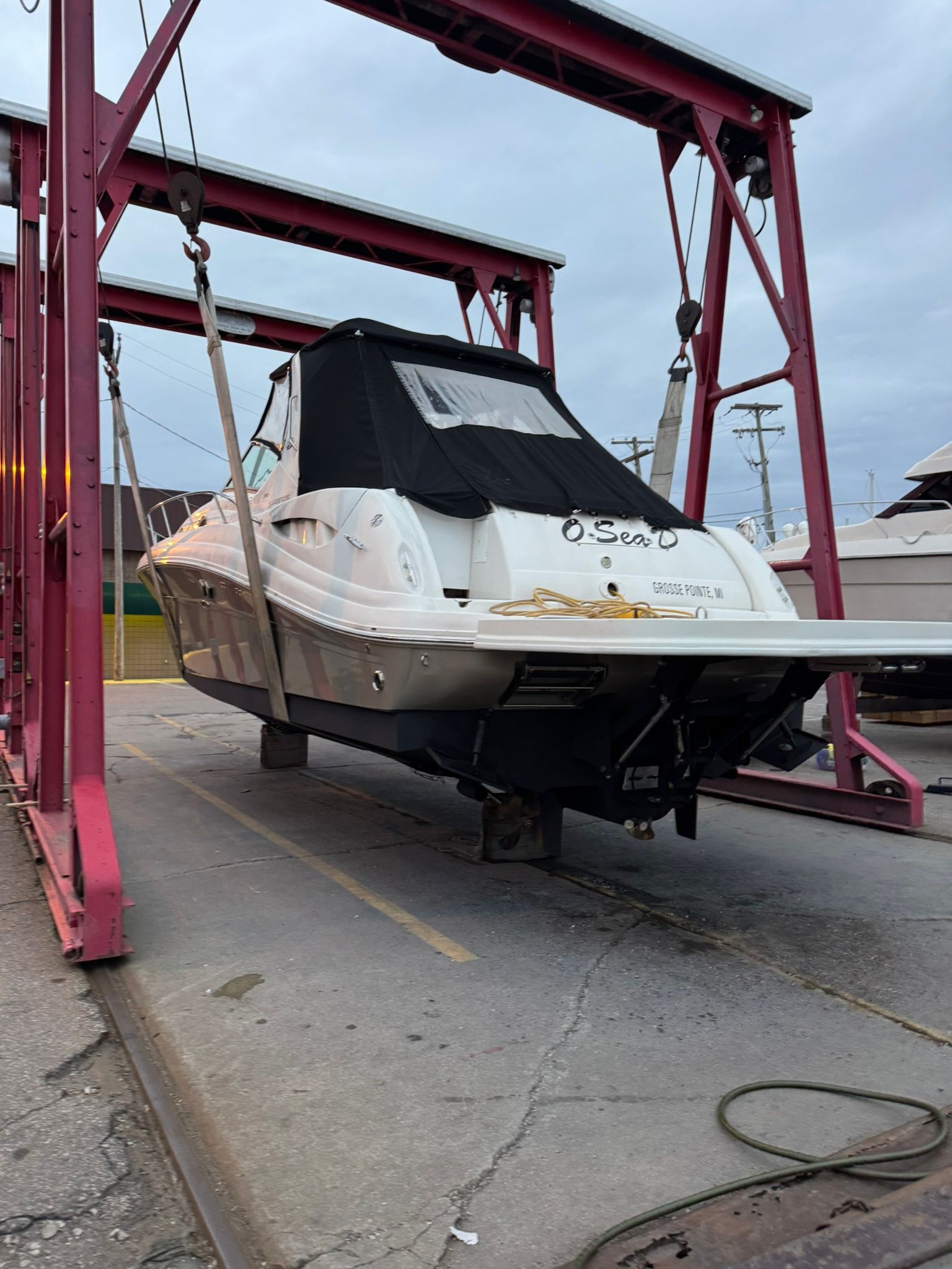 2007 Sea Ray 340 Sundancer on a boat lift.