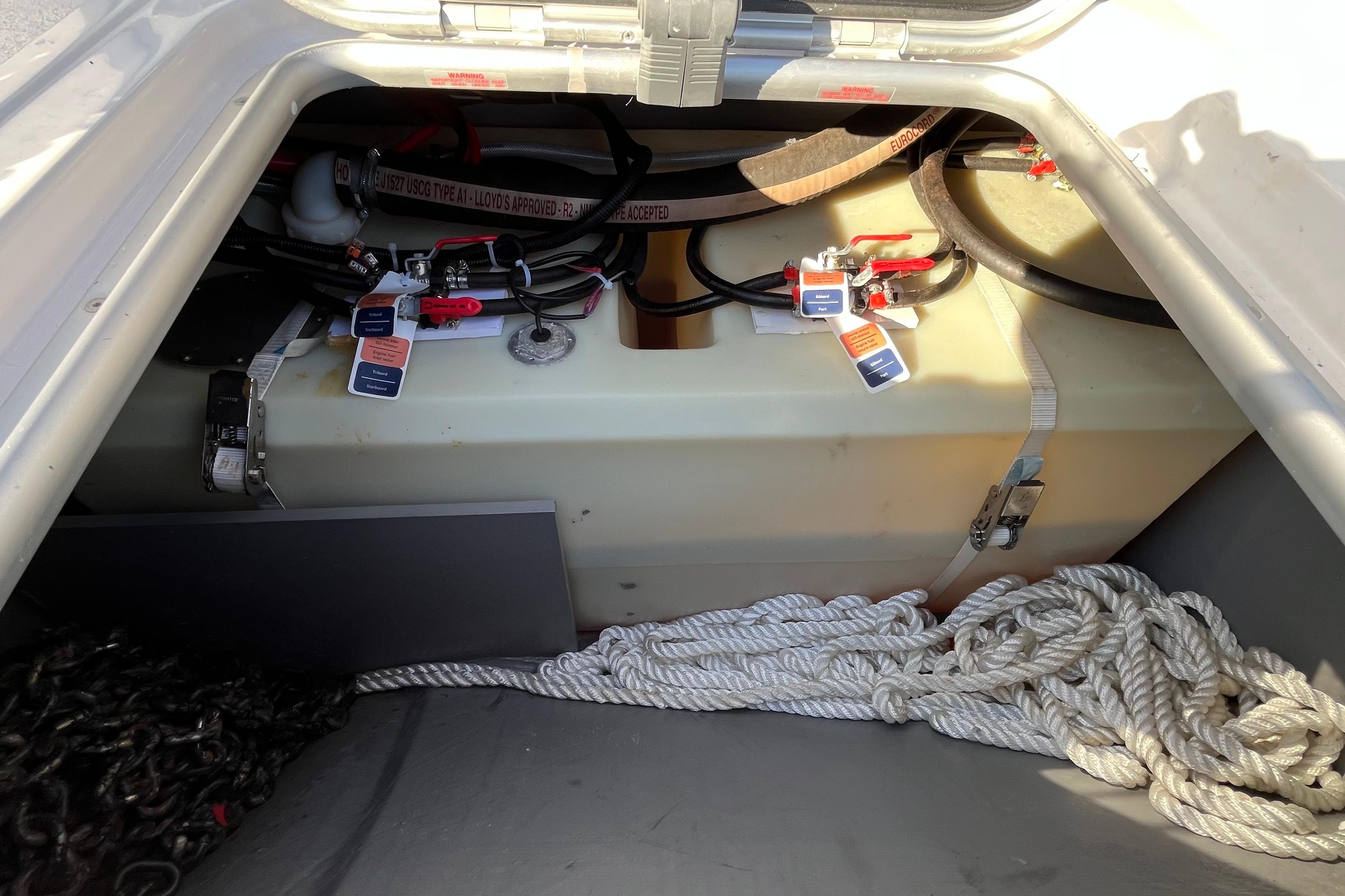 Storage compartment of 2024 Outremer 45 with ropes and equipment.