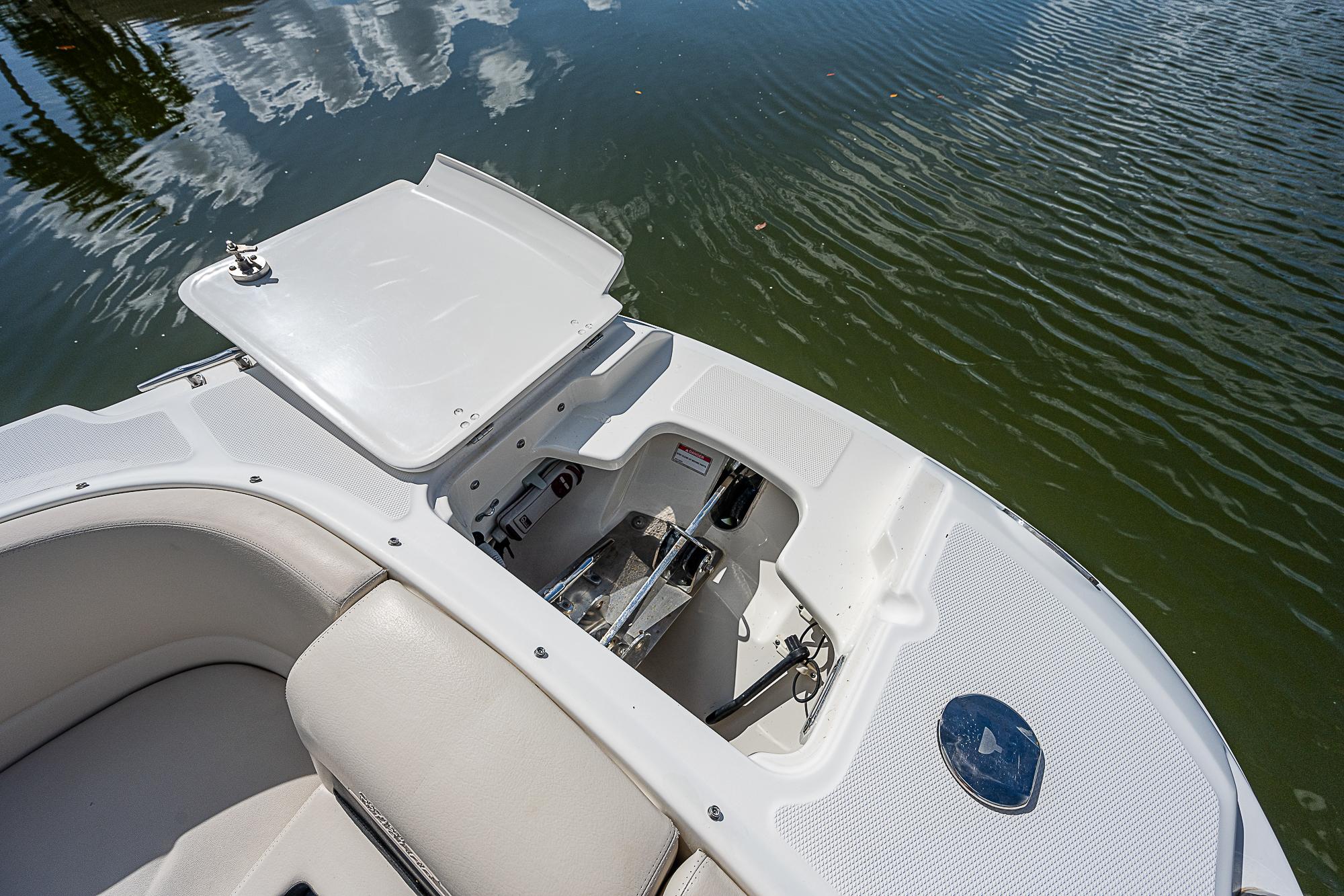 2018 Boston Whaler 270 Vantage boat interior with open storage compartment.