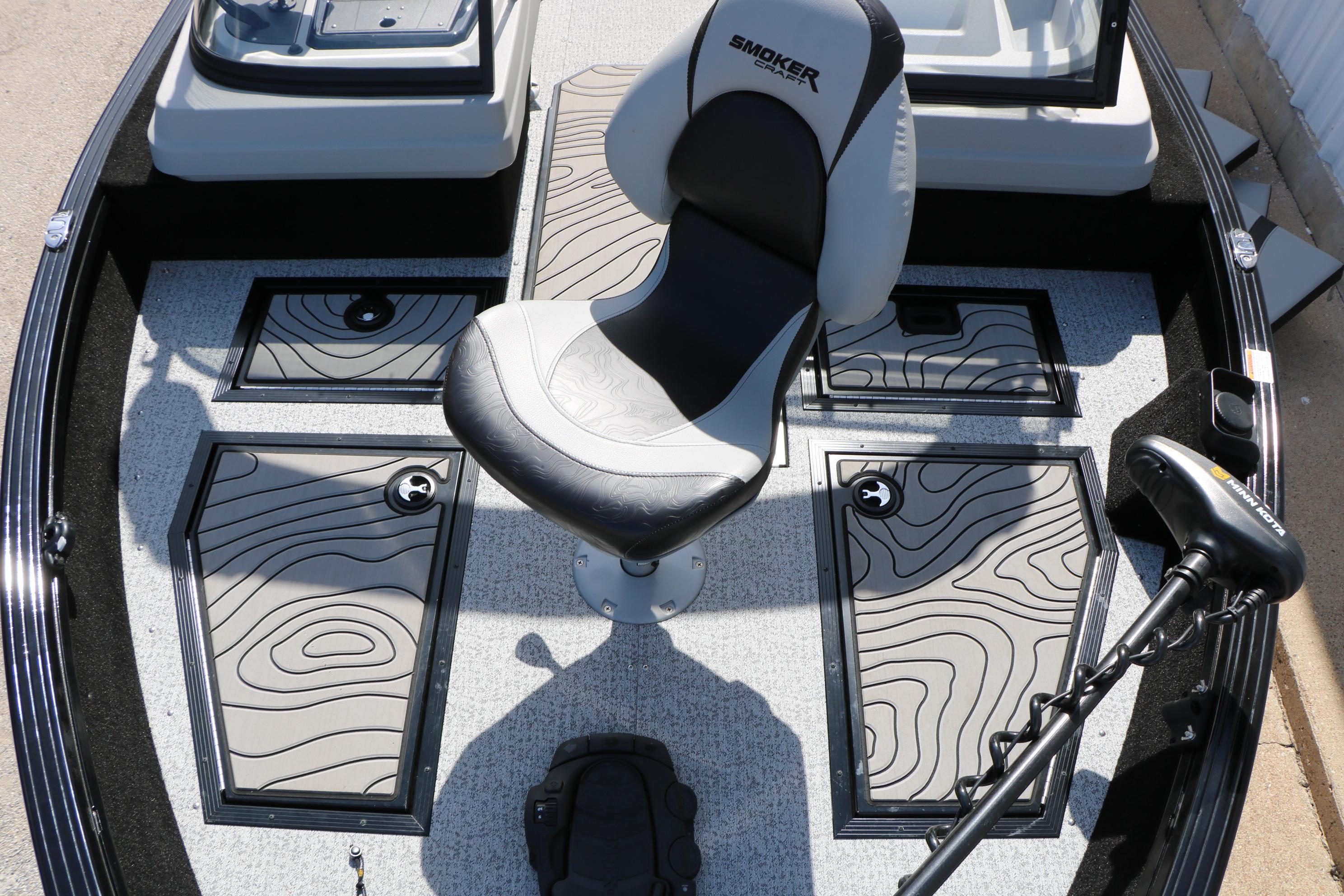 2025 Smoker Craft Adventurer 188 DC boat interior with swivel seat and storage compartments.