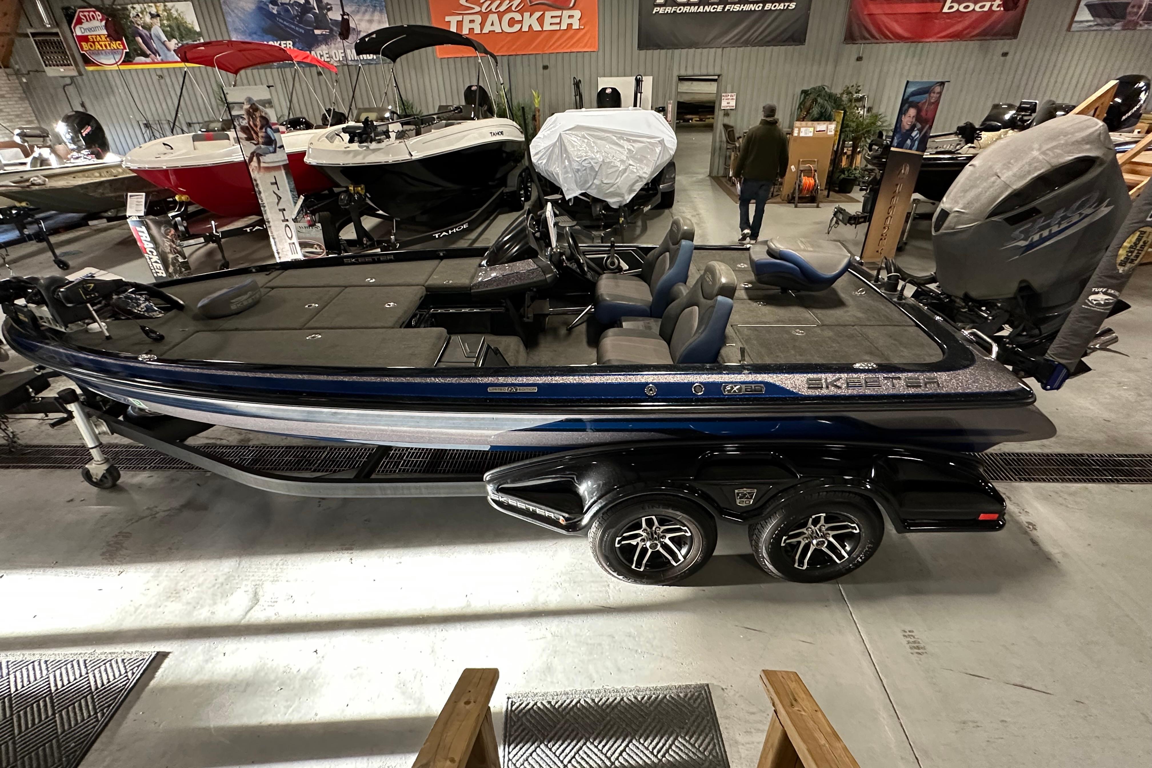 2016 Skeeter FX20 Limited Edition bass boat displayed indoors on a trailer.