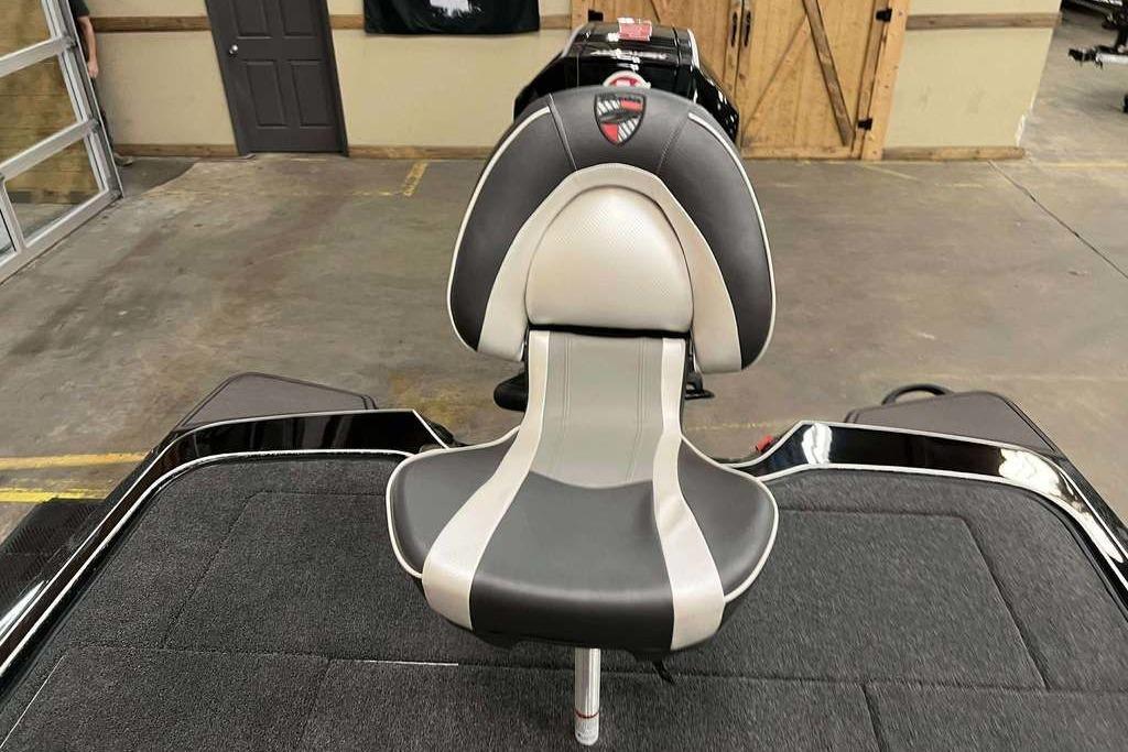 2026 Triton 20XP Patriot boat seat in a showroom setting.