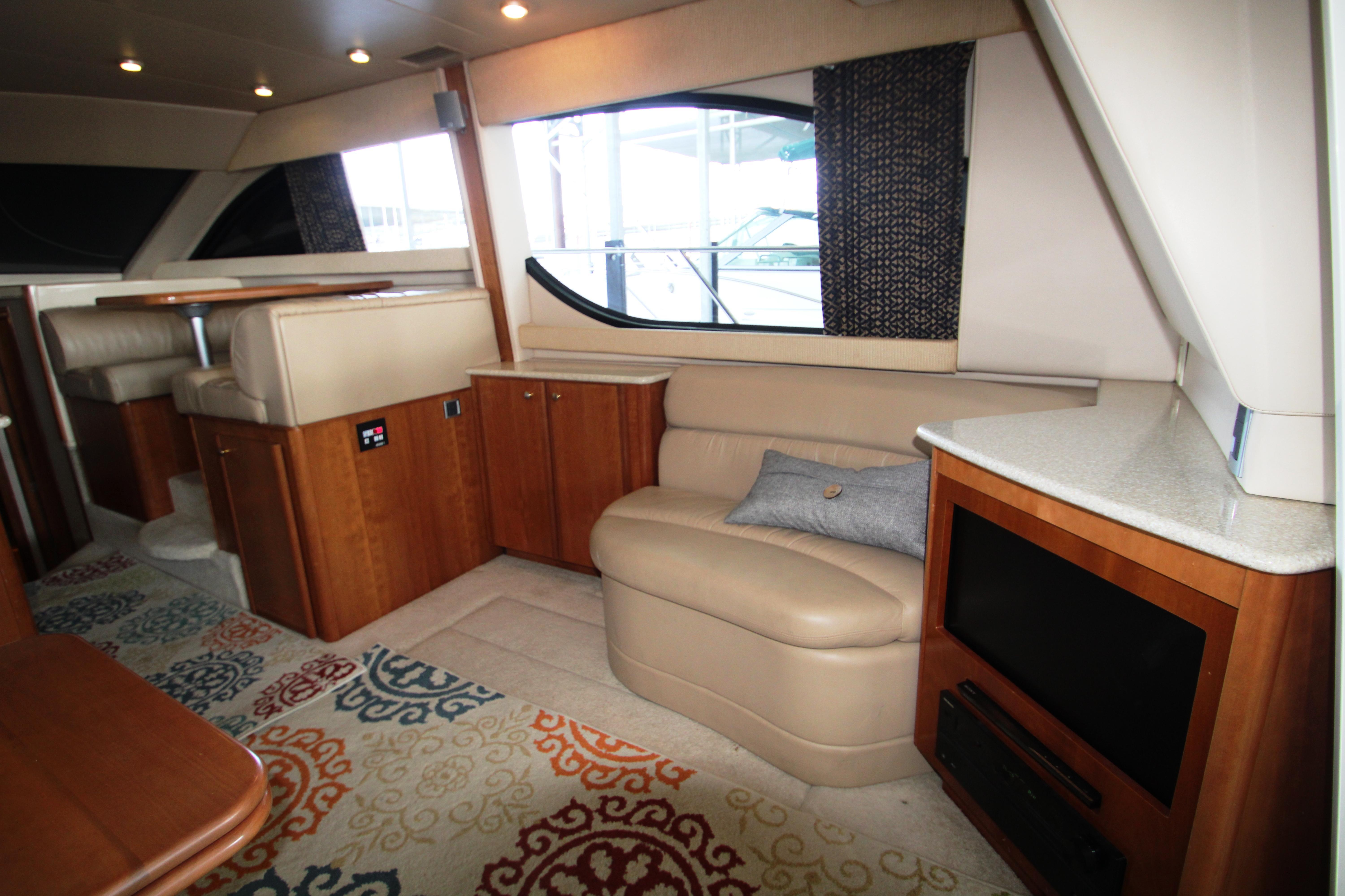 Interior of a 2003 Meridian 381 Sedan yacht with elegant furnishings.