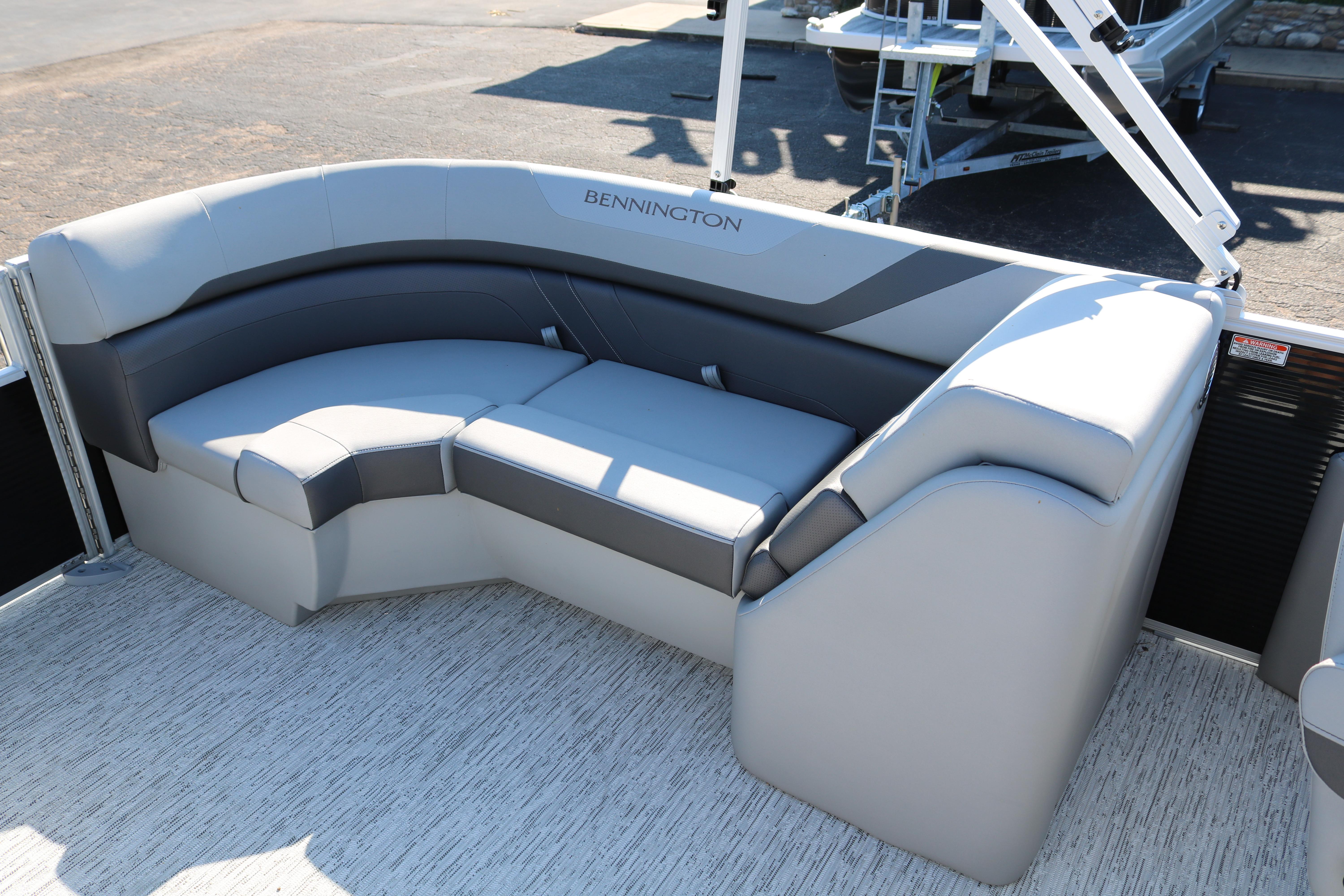 2026 Bennington 22SX Stern Radius boat seating with gray upholstery and modern design.