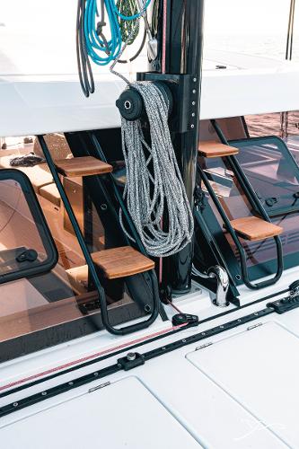 2025 Nautitech 40 Open yacht deck with rigging and wooden steps.