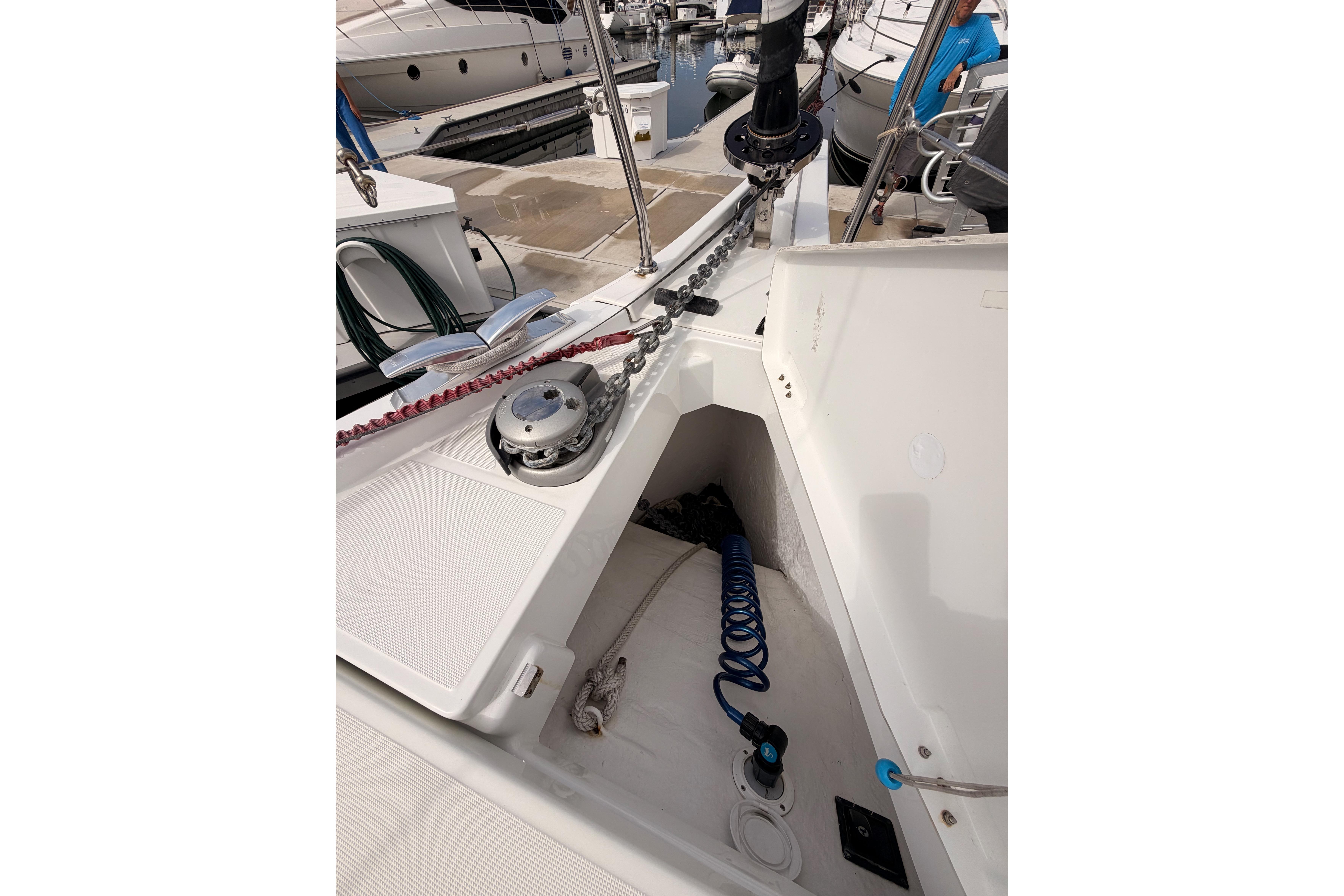 Anchor locker of 2020 Beneteau Oceanis 46.1 sailboat, featuring chain and winch.