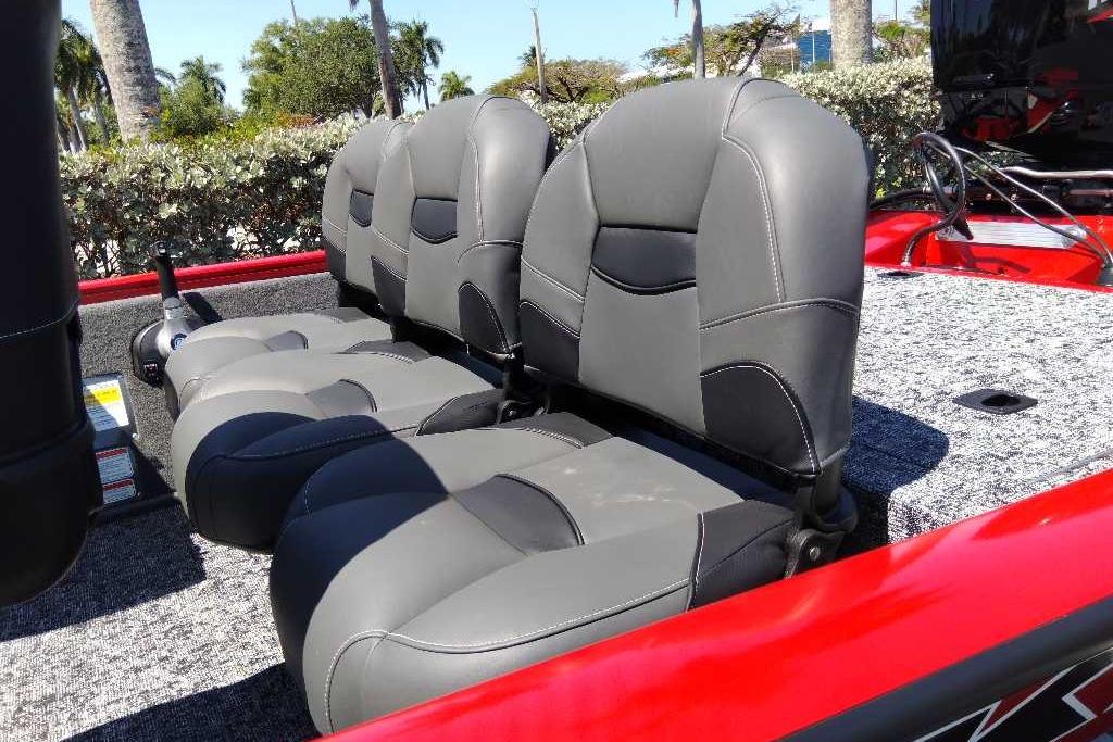2026 Tracker Pro Team 175 Crappie Edition boat seats, gray upholstery, outdoor setting.