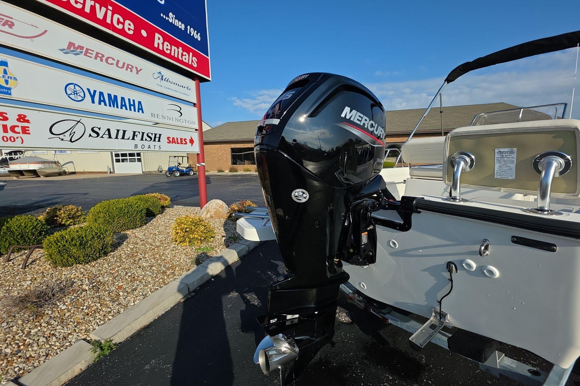 2026 Boston Whaler 170 Montauk with Mercury outboard motor at dealership.
