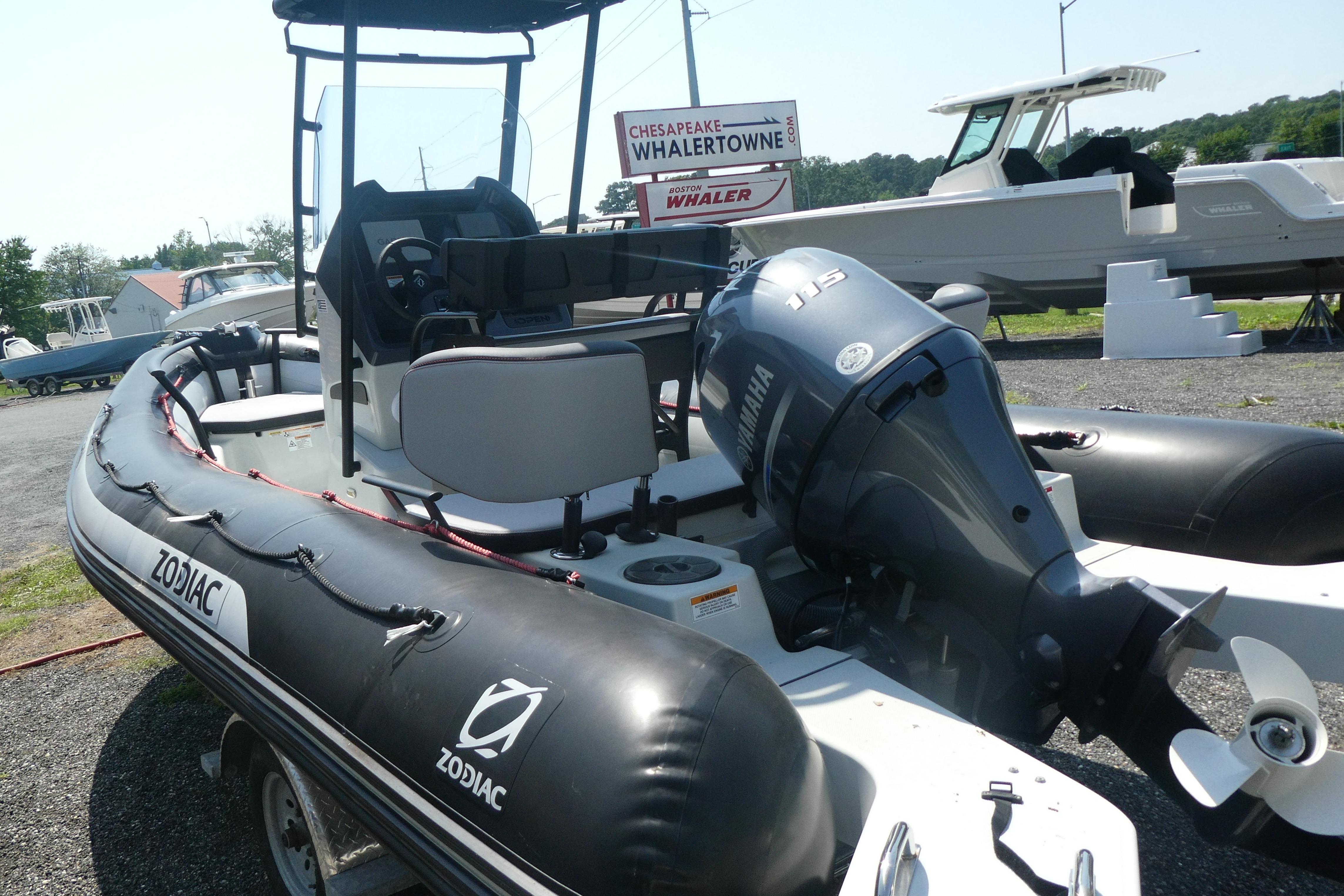 2022 Zodiac Pro 5.5 inflatable boat with Yamaha outboard motor, displayed outdoors.
