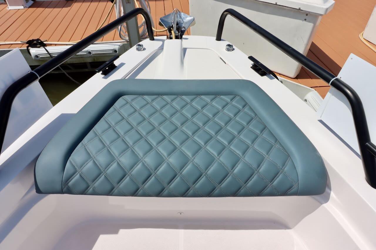 2022 Axopar 37 XC Cross Cabin with quilted seating detail on deck.