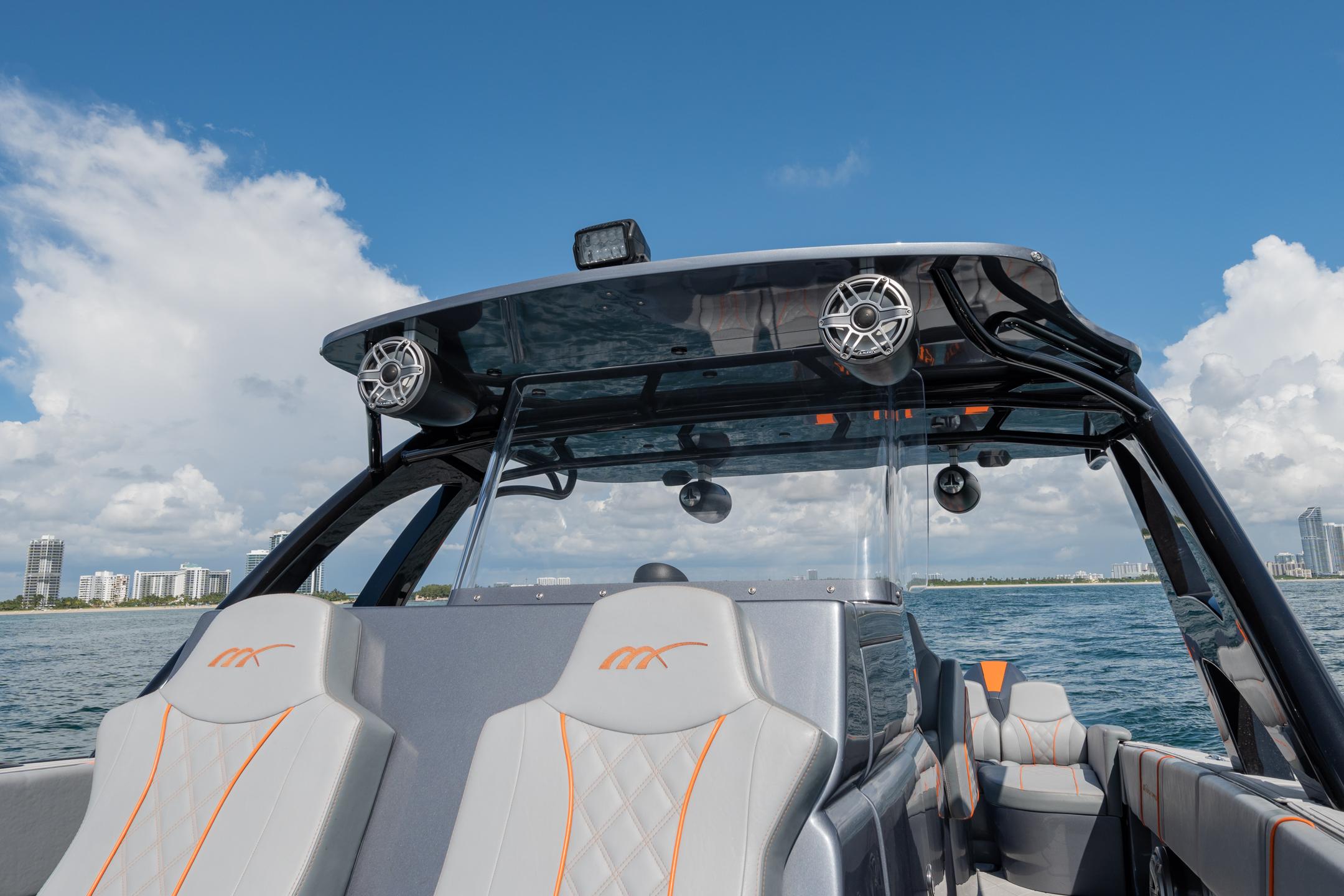2022 Midnight Express 37' Open boat on water, featuring sleek design and modern seating.