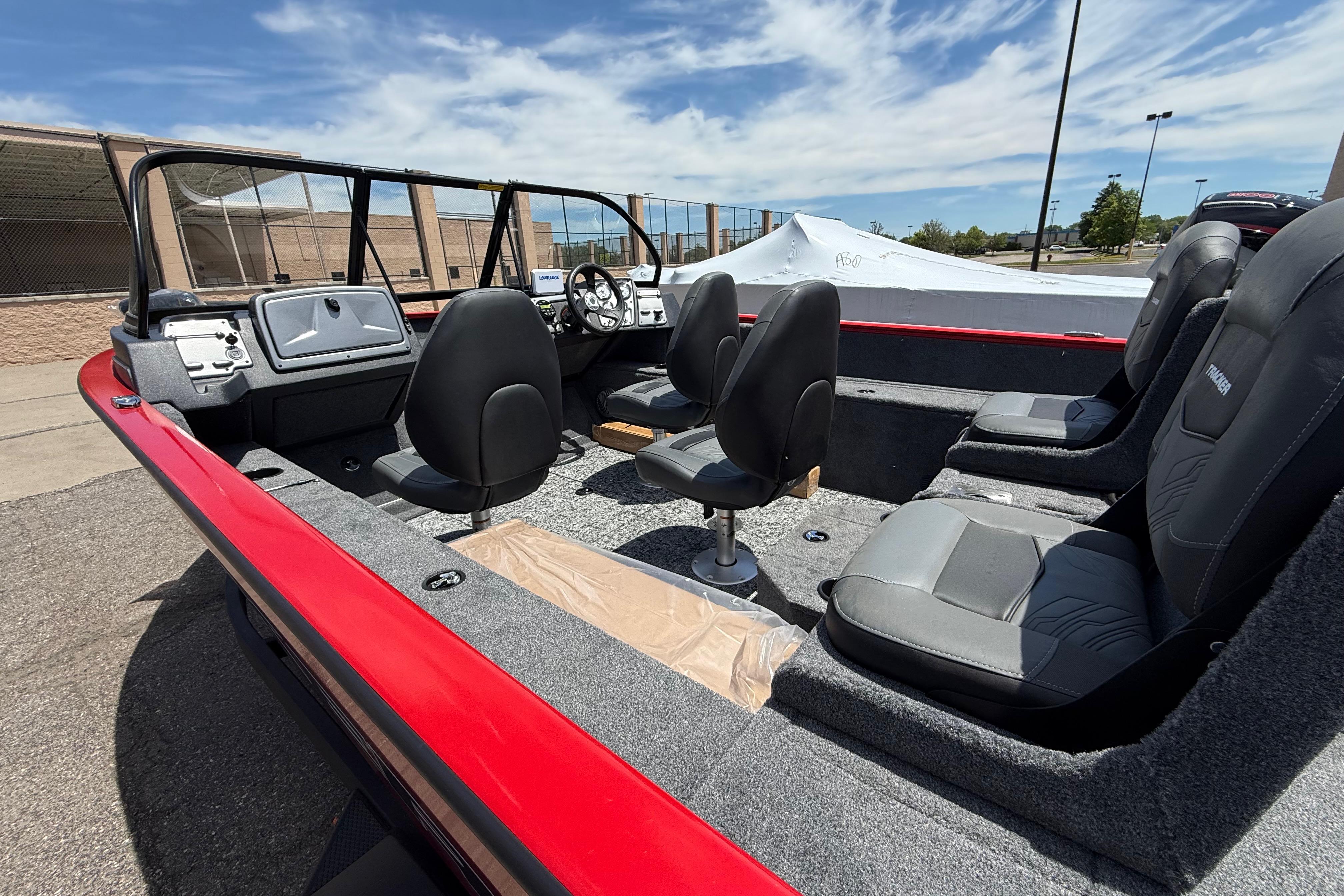 2026 Tracker Pro Guide V-175 Combo boat interior with seating and steering console.