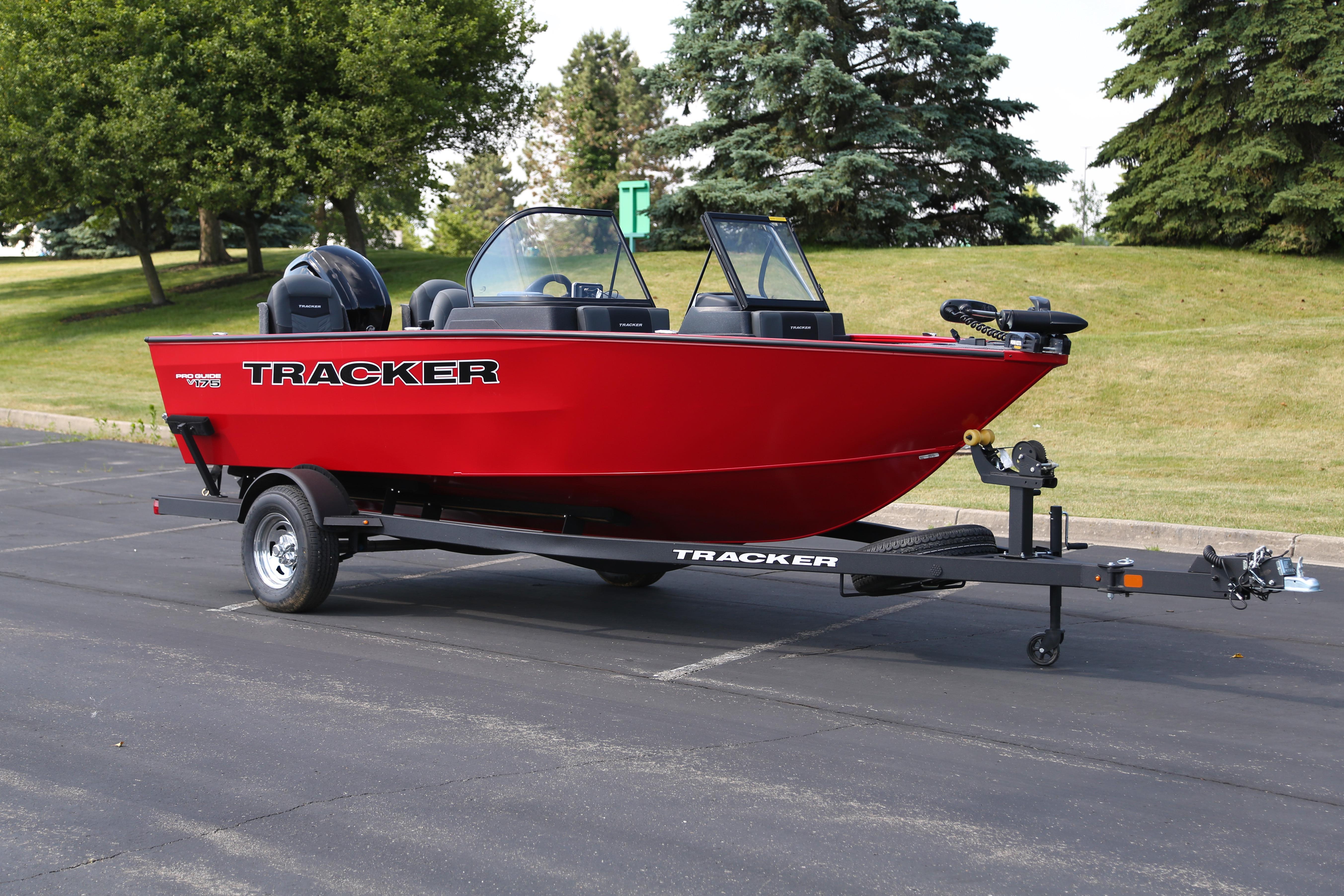 2026 Tracker Pro Guide V-175 Combo boat on trailer, parked outdoors.