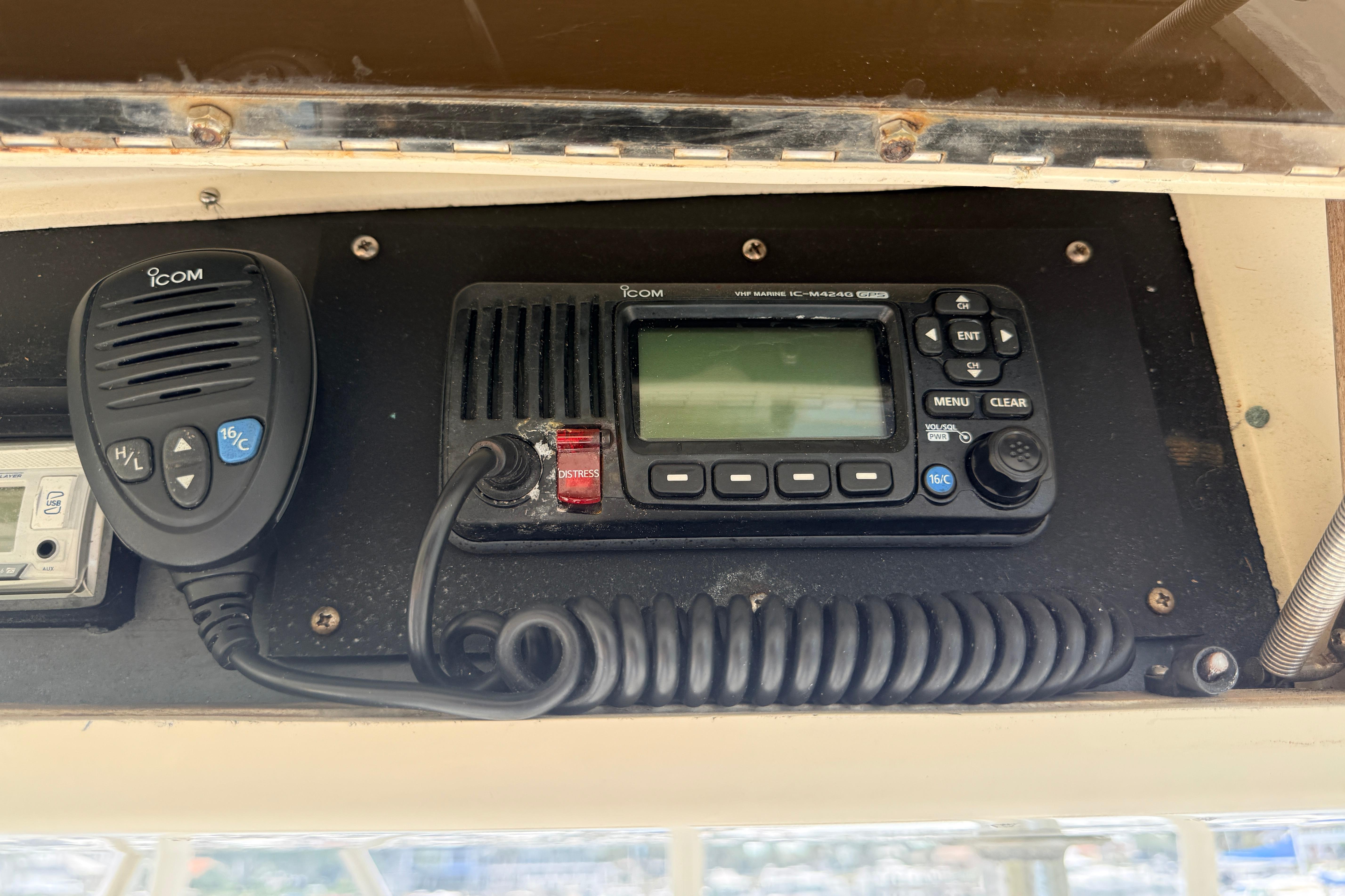 VHF marine radio on 1986 Viking 35 Convertible boat dashboard.
