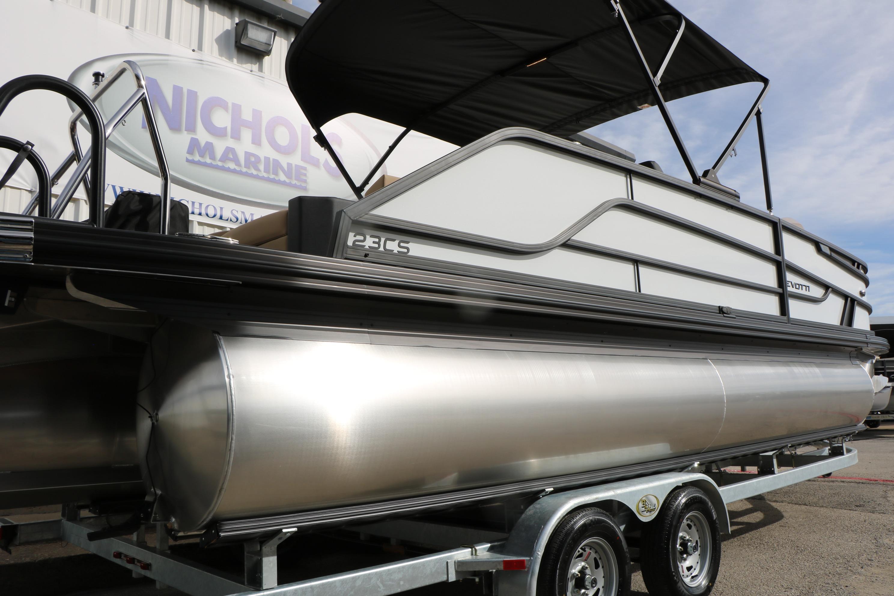 2026 Evotti 523CS pontoon boat on trailer at Nichols Marine dealership.