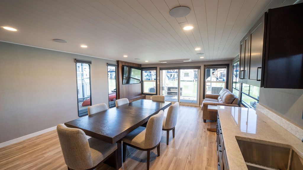 Interior of a 1999 Sumerset Widebody houseboat with modern design.