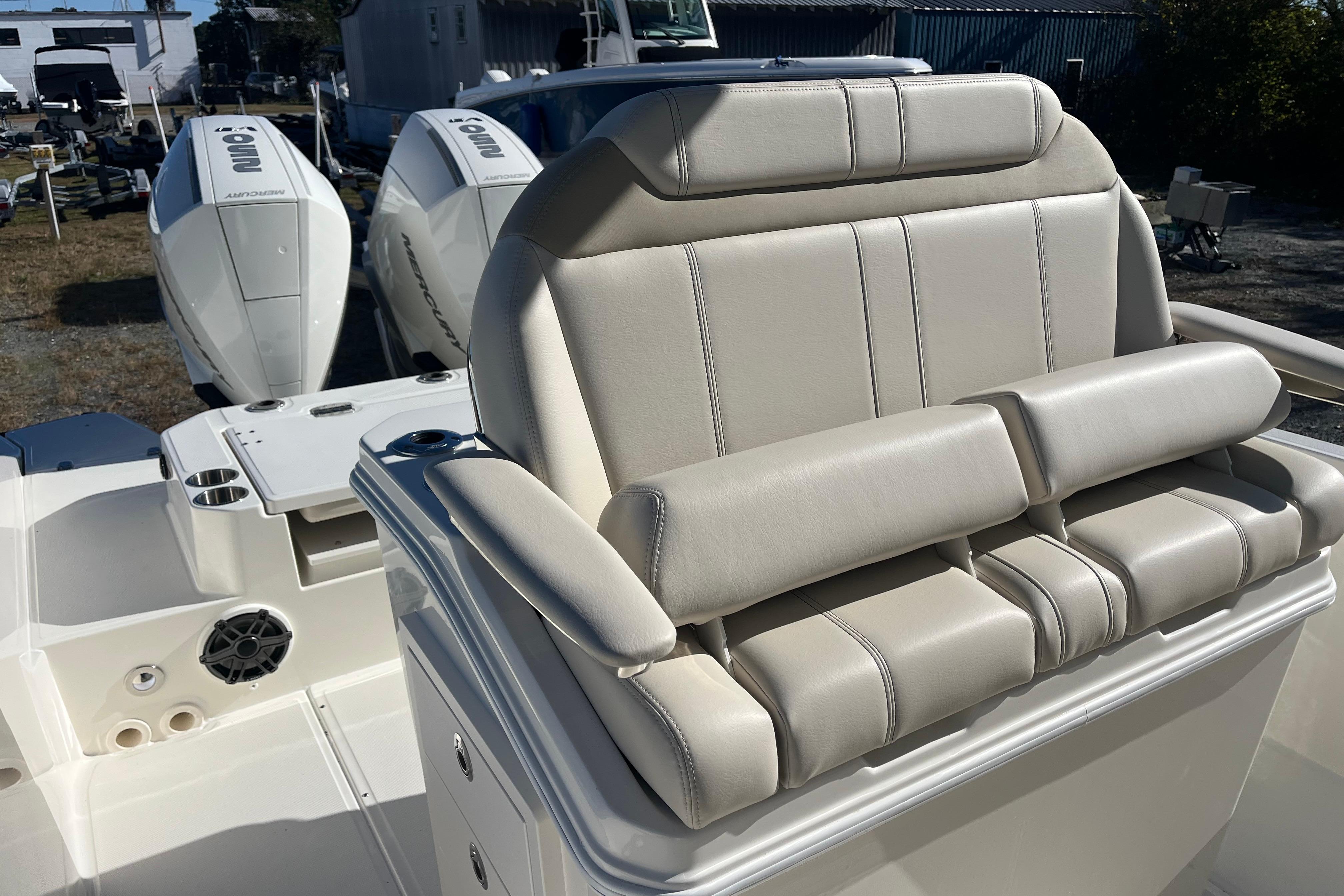2026 Boston Whaler 280 Dauntless boat with luxurious seating and powerful engines.