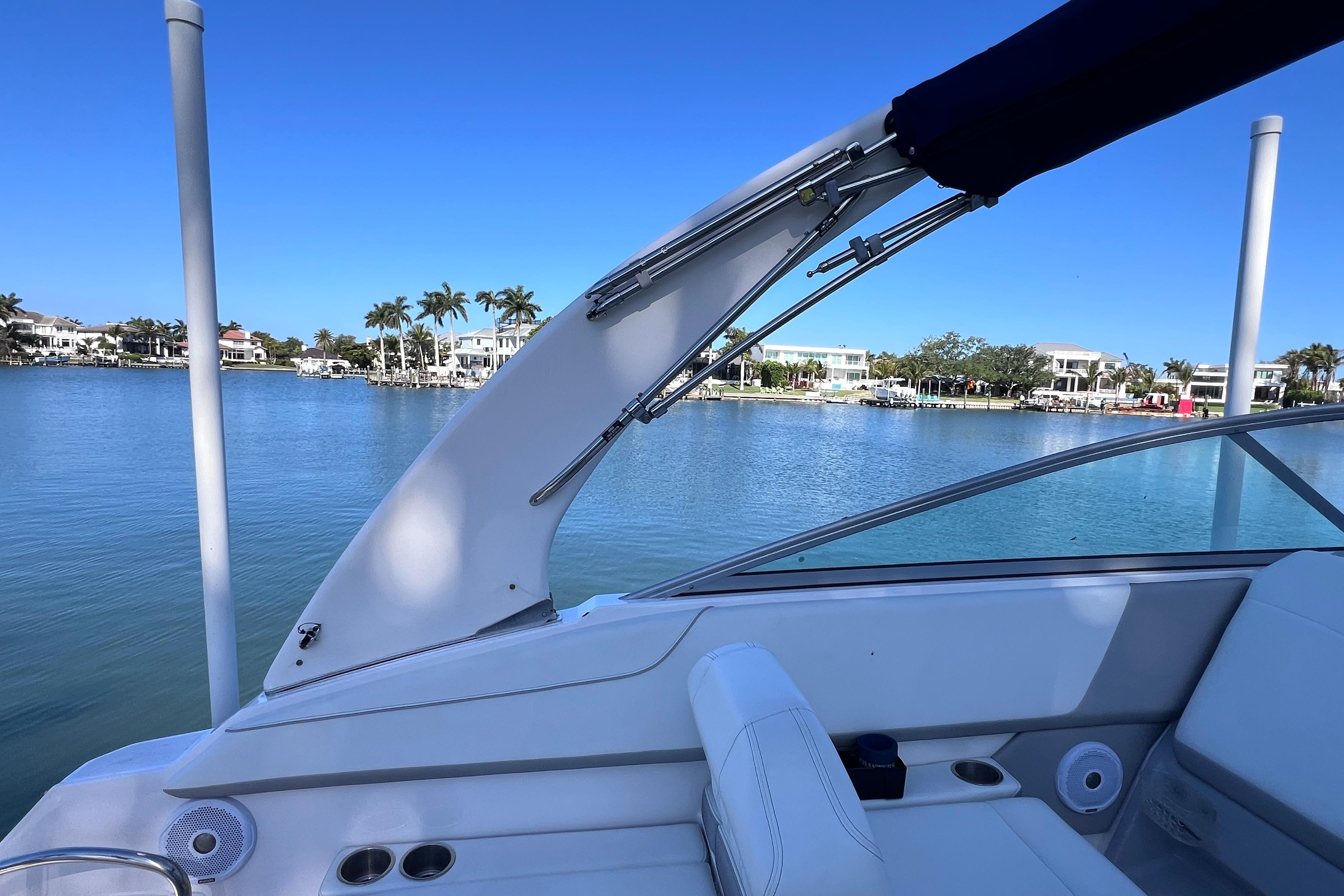 2020 Regal 26 XO boat interior with scenic waterfront view.