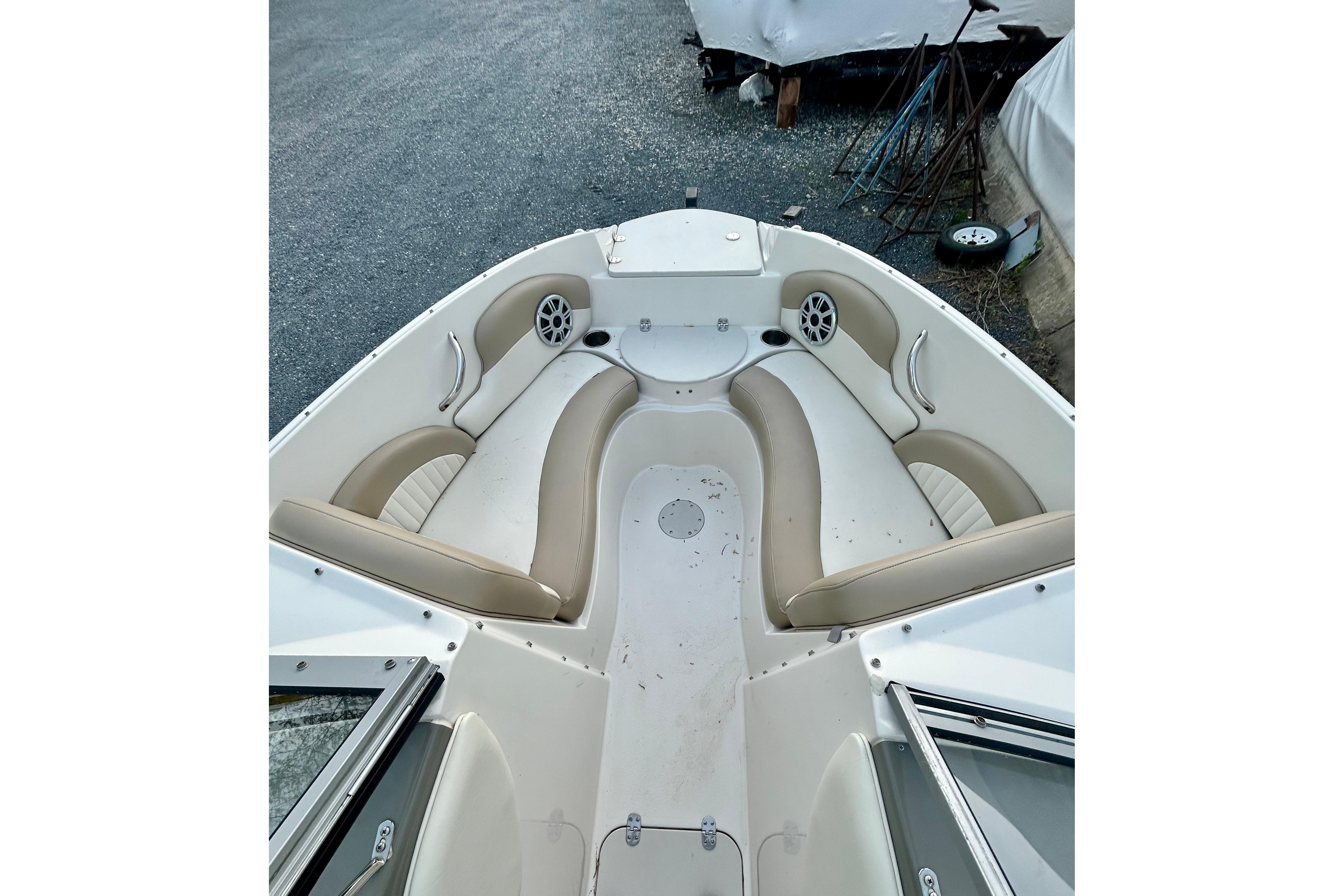 2017 Stingray 204 LR boat interior with beige seating and speaker system.
