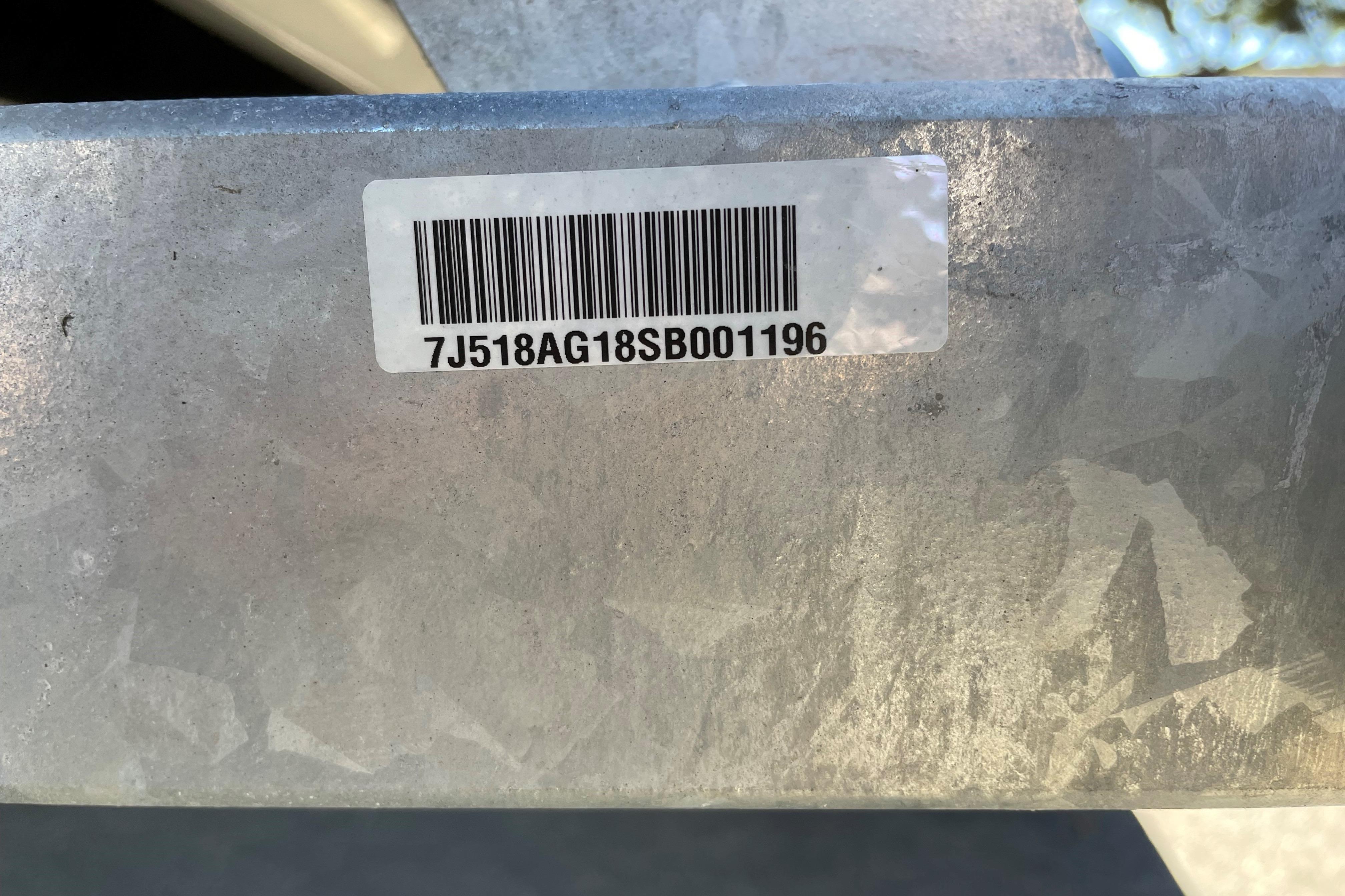 Barcode on metal surface of 2025 Mako Pro Skiff 15 CC boat.