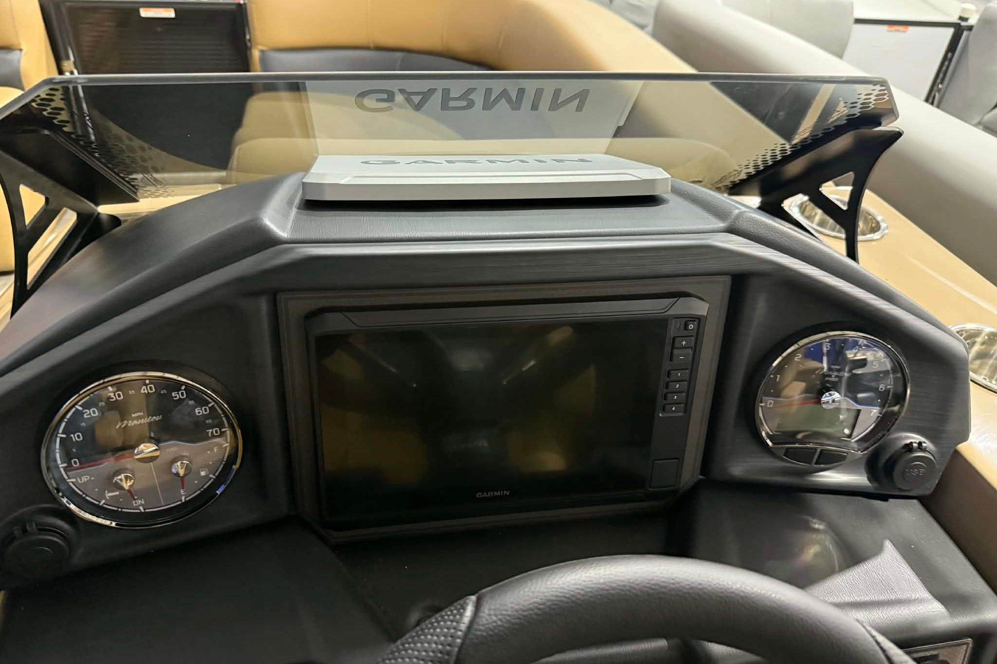 2026 Manitou Encore VP 230 dashboard with Garmin navigation system and gauges.