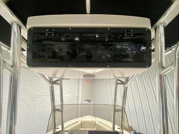 2024 Key West 219 FS boat console with T-top and windshield.