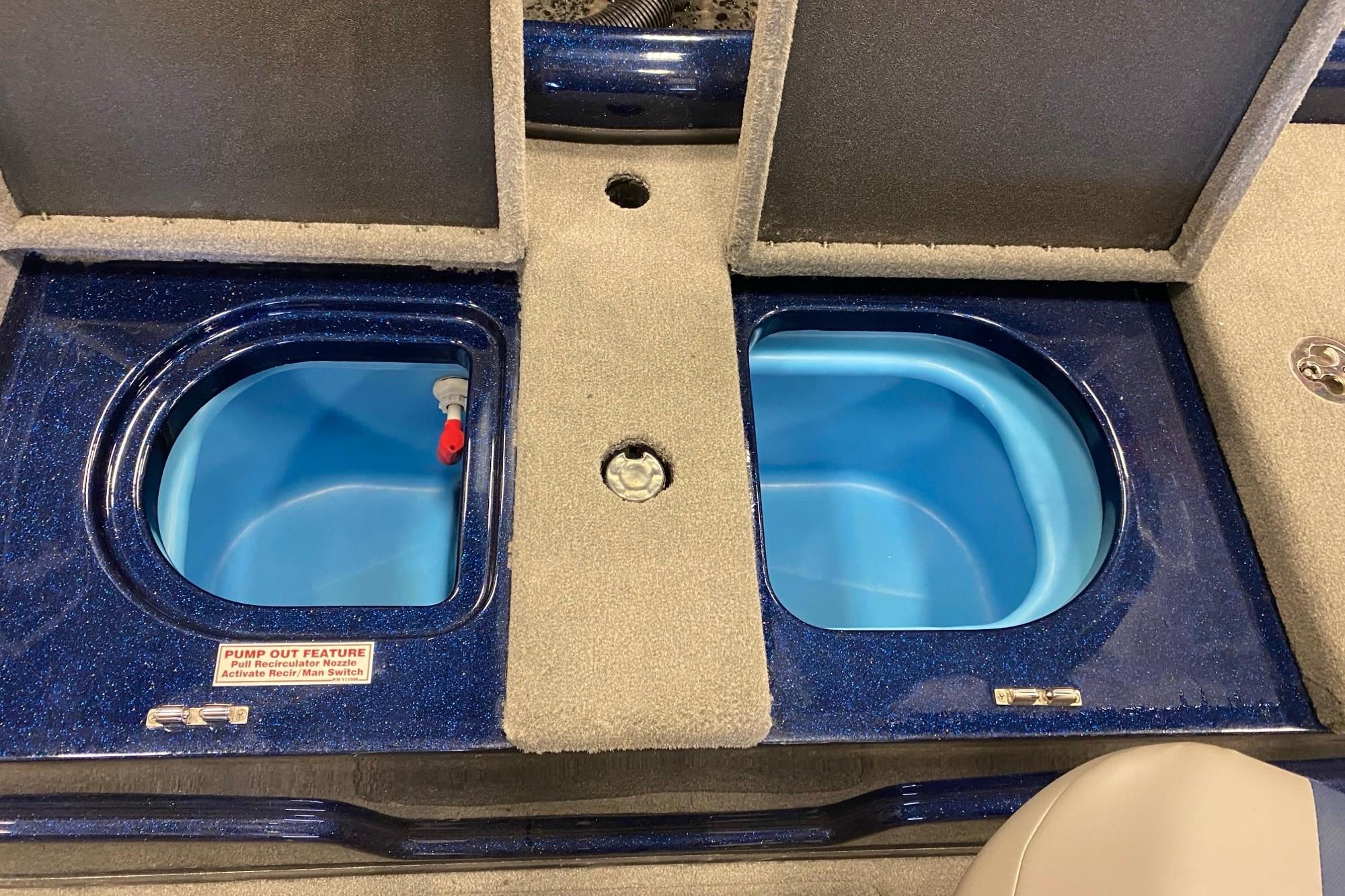 Livewell compartments in a 2026 Nitro ZV19 Pro boat, featuring pump-out feature.