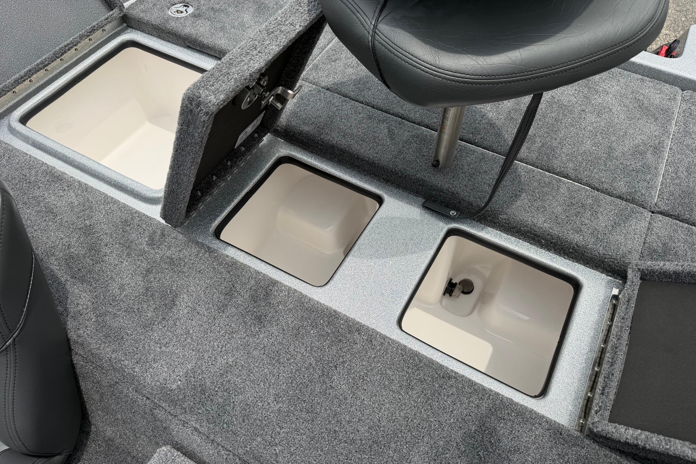 Interior view of 2027 Falcon F20 PREDATOR boat with storage compartments and seating.